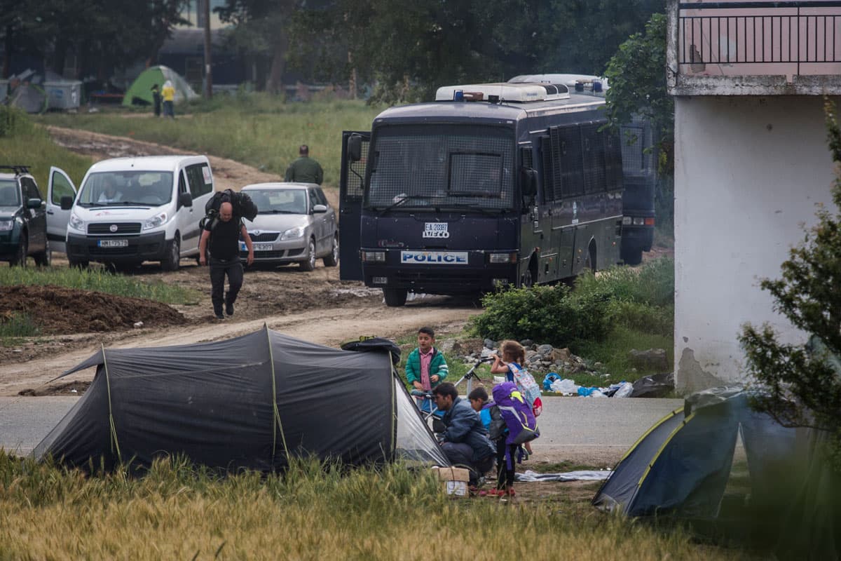 Police surrounded Idomeni Camp in order to begin evacuating the approximately 8,500 immigrants and refugees who have been camping there, many of whom arrived in early March.