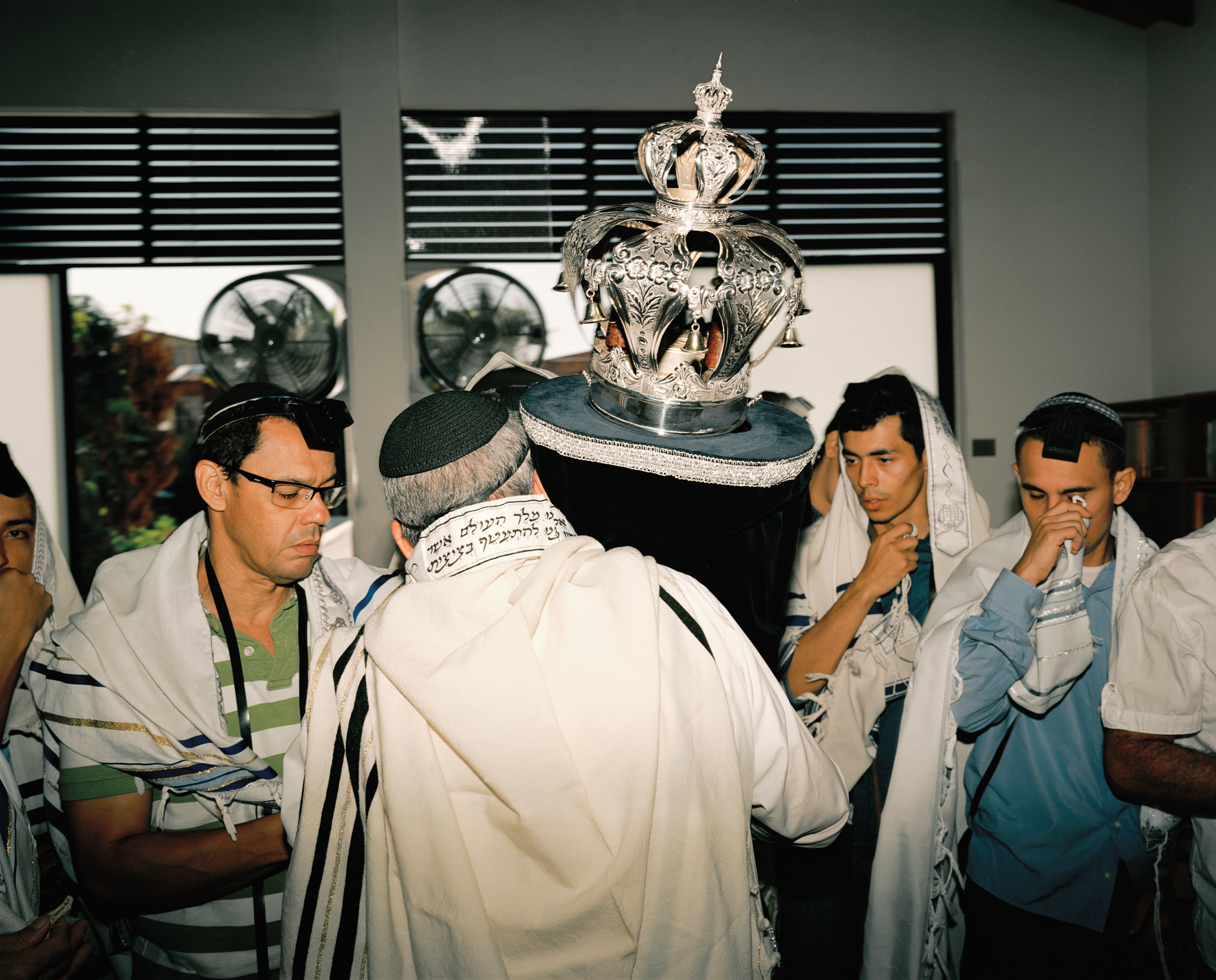 Jewish men in Bello, Colombia carrying the Torah.