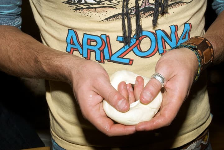 Jake Levine forming dough into bagel.  Menachem and Jake’s apartment, October 14, 2010.
