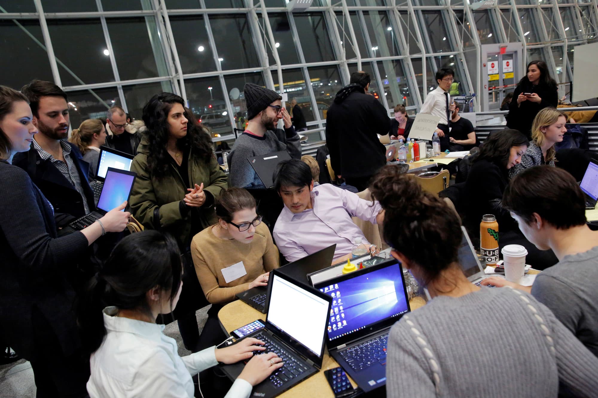 Volunteer lawyers work in a dining area of Terminal 4 to assist travelers detained as part of Donald Trump's travel ban in Terminal 4 at John F. Kennedy International Airport.