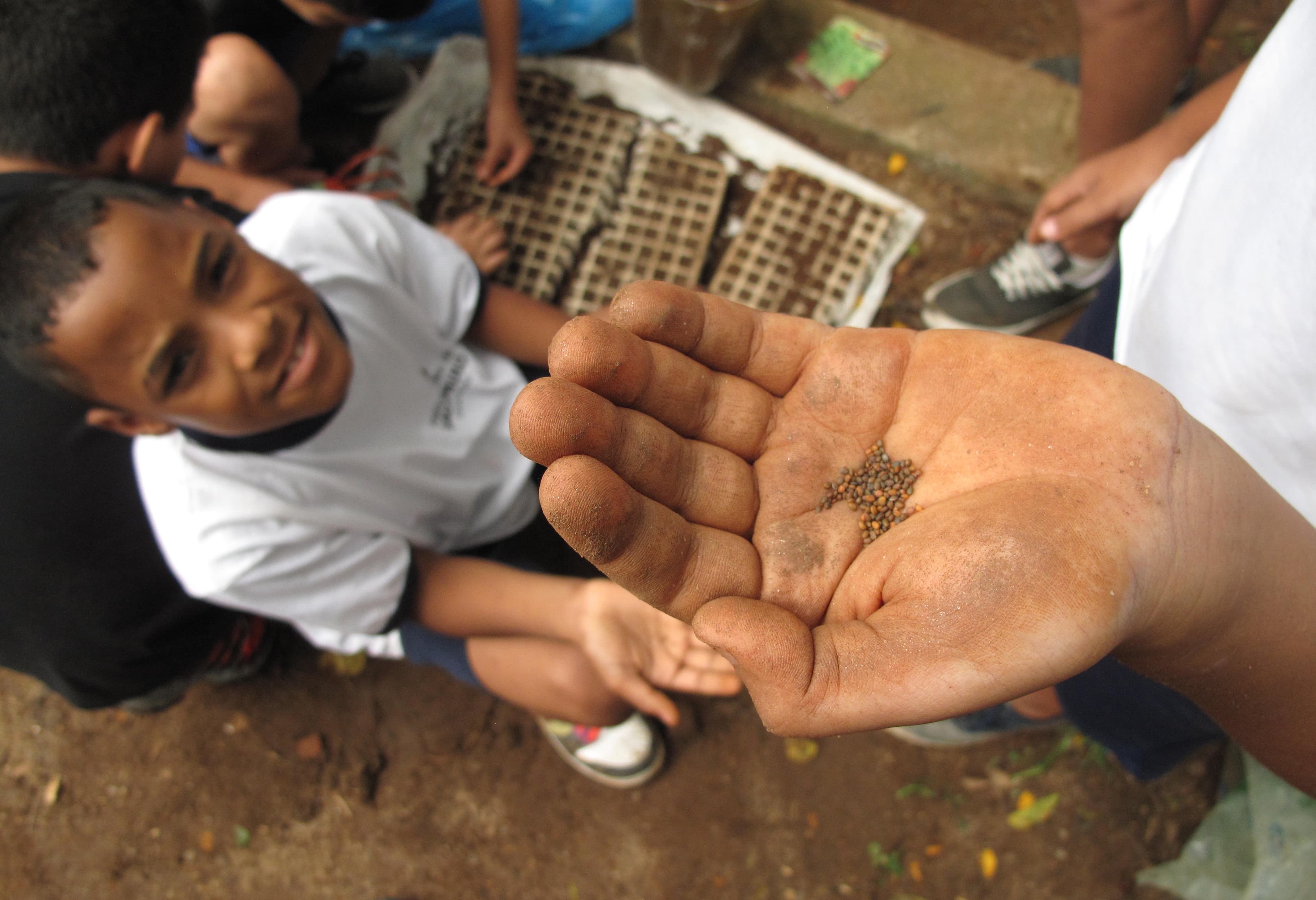 Students say the school garden project is teaching them a lot about how to grow food, though it's still hard for some of them to appreciate vegetables.