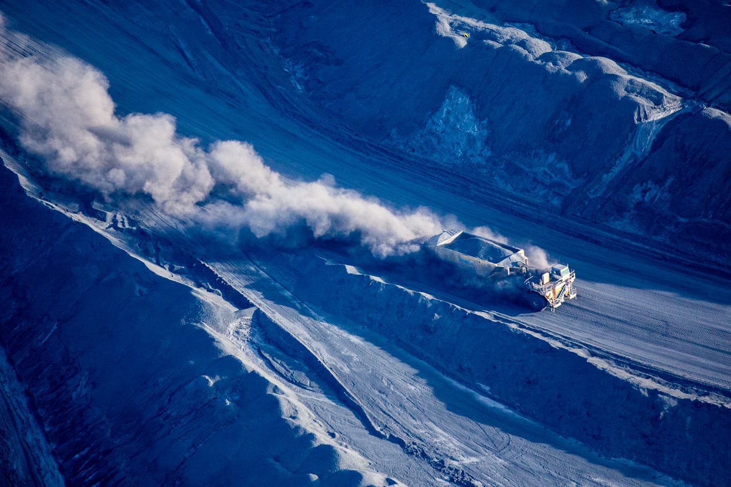 A large transport truck moves petroleum coke, a by-product of upgrading tar sands oil.