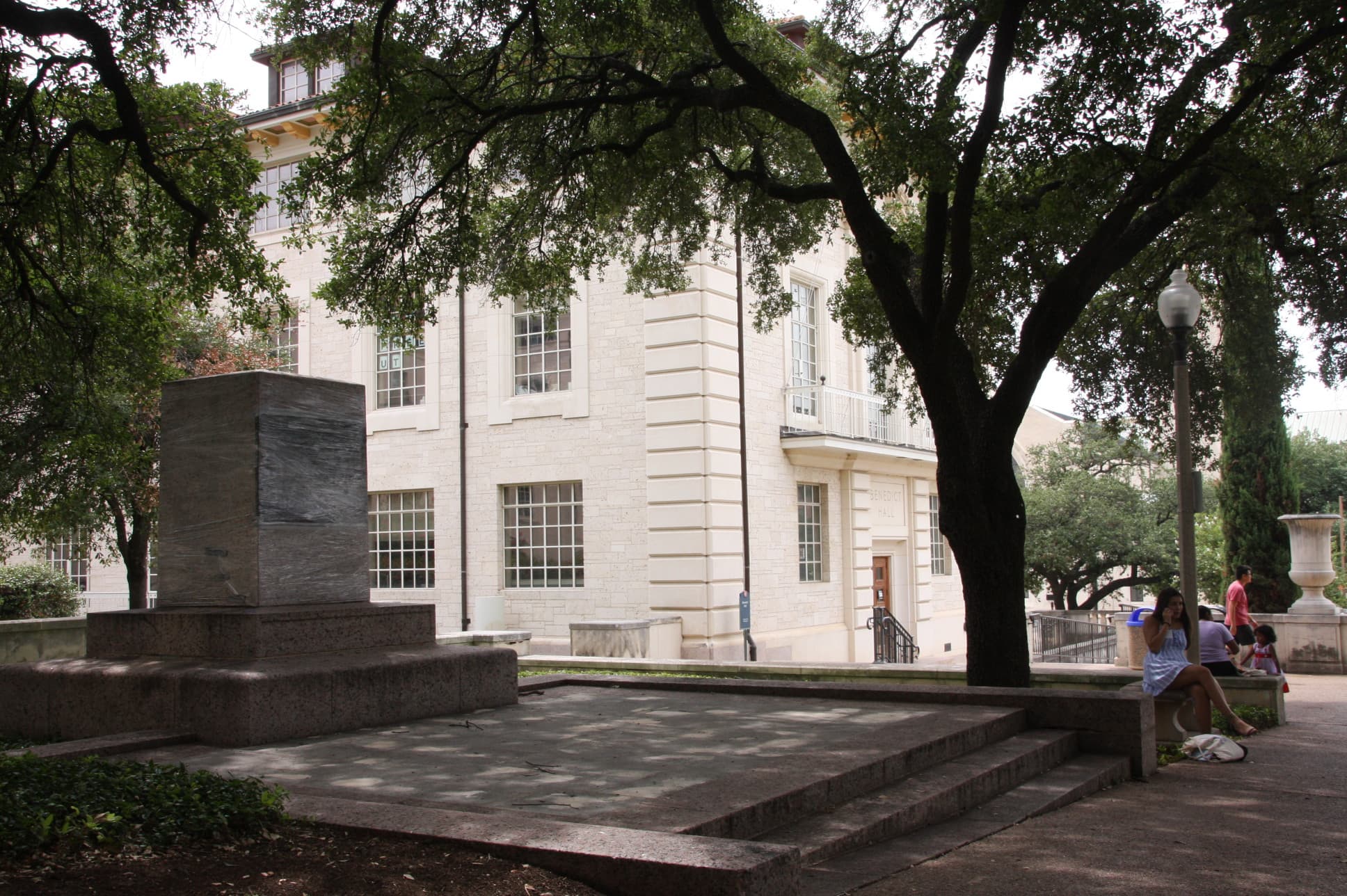 An empty statue plinth stands on the South Mall at the University of Texas at Austin.