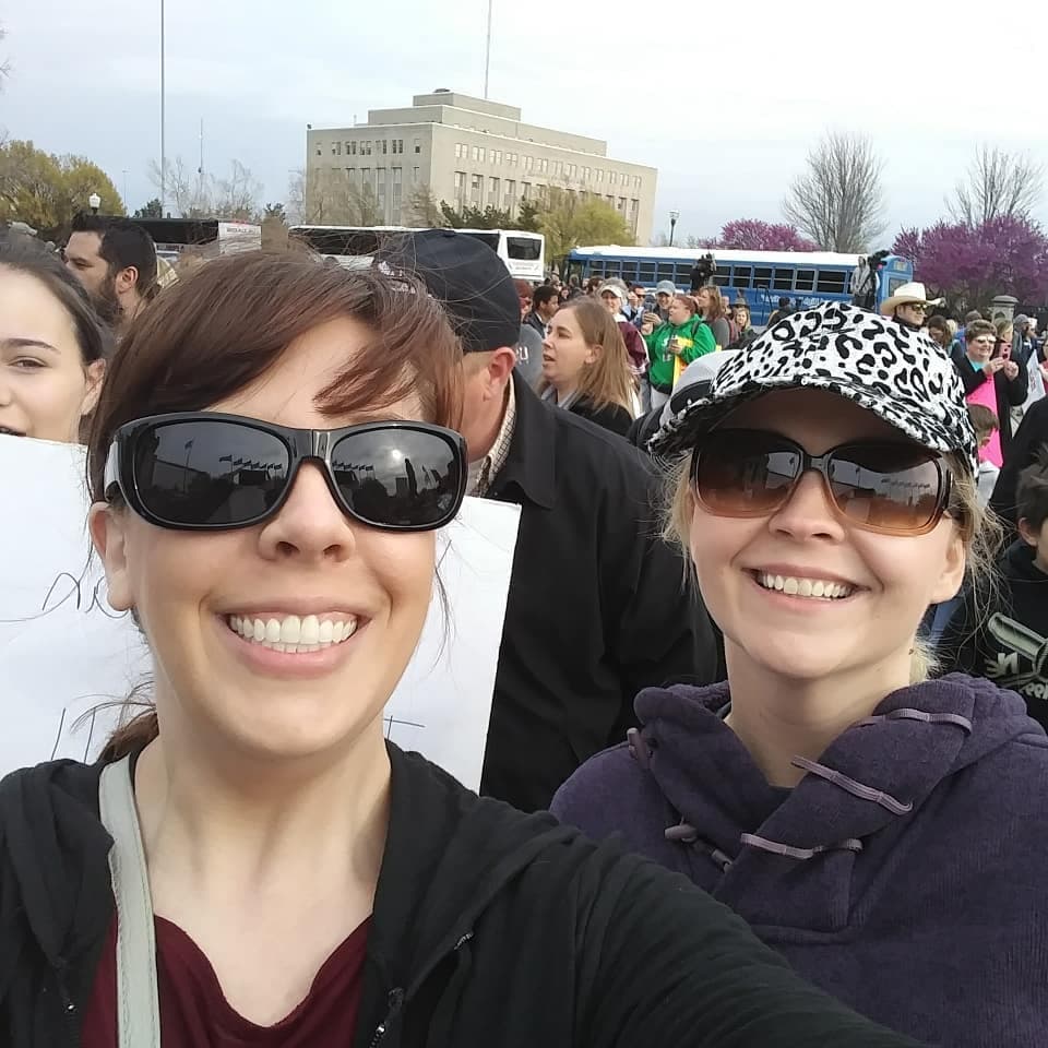 Two Oklahoma teachers at a protest for more education financing.