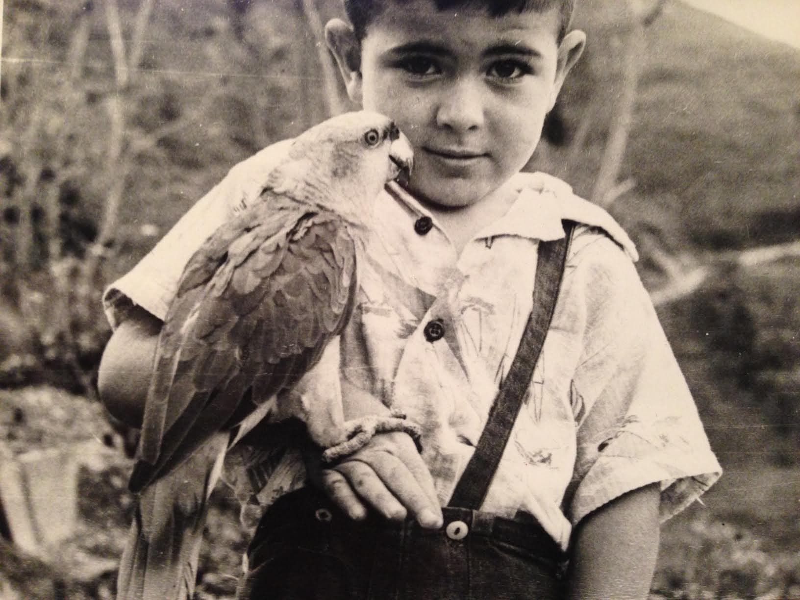 John Campbell and his talking parrot, Lorita, in Segovia, Colombia.