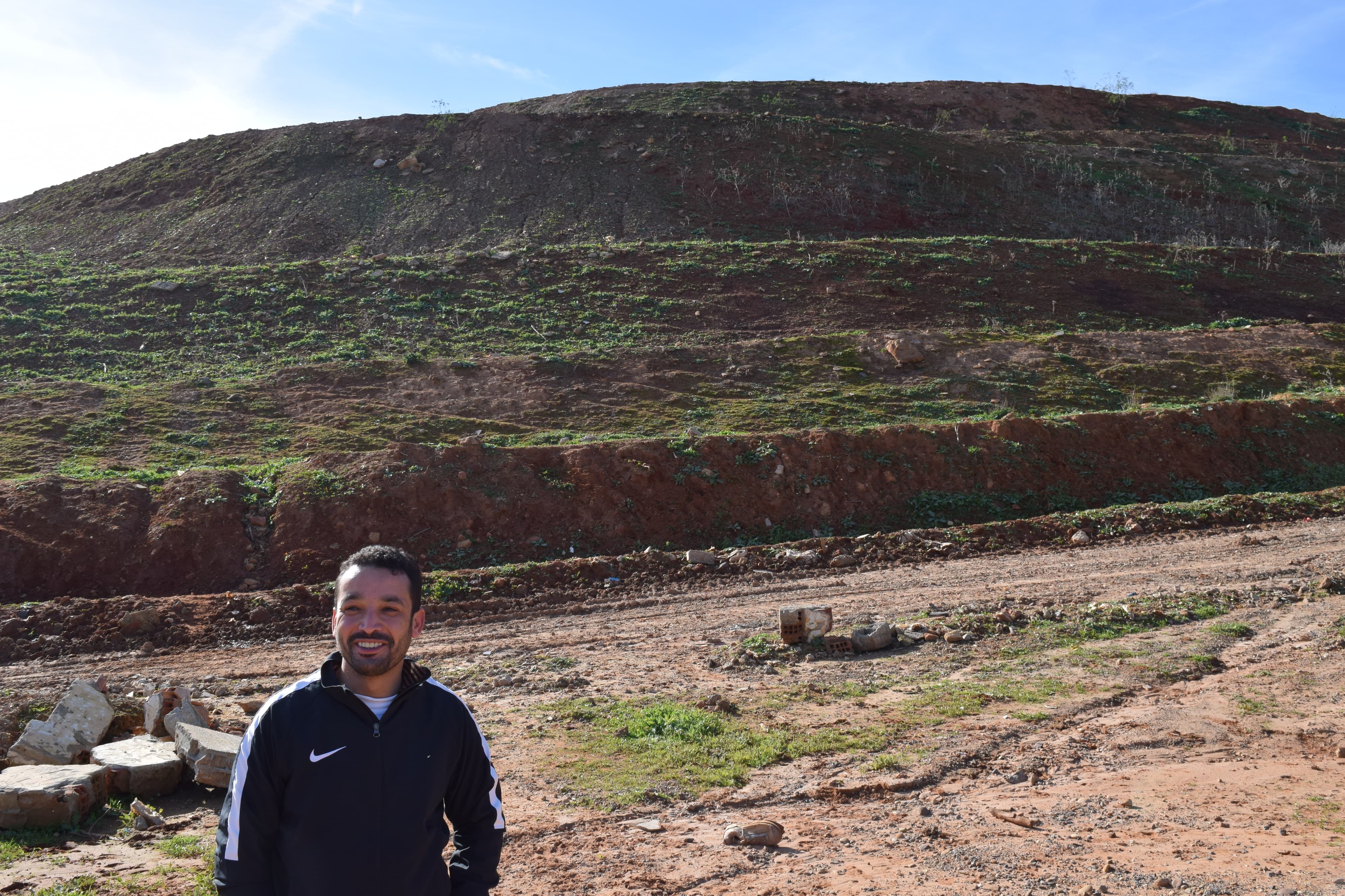 Yassine Mazzout at the site of the former landfill outside Morocco's capital Rabat, where he worked as a trash picker as a teenager. Mazzout is now the president of the At-Tawafouk recycling cooperative.