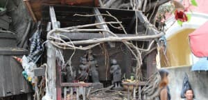 Figures in the shrines represent a multitude of personages from the Burmese pantheon, mixing figures of the Buddha with nat and weikza figures from traditional spirit worship. (Photo: Bruce Wallace)