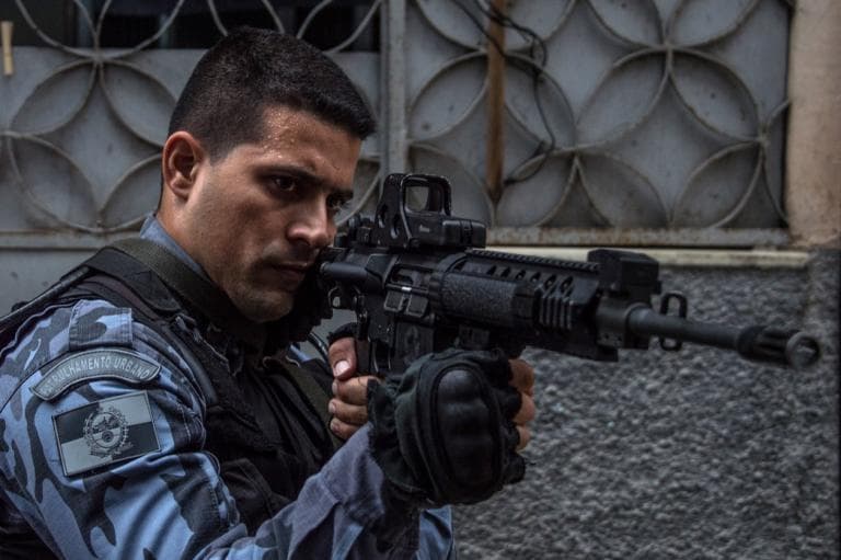 Brazil's militarized police patrol a shanty in Rio de Janeiro on April 1.