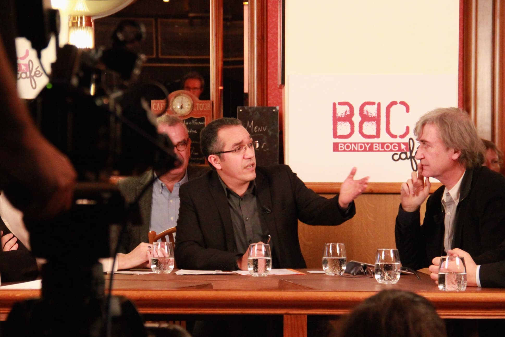 French caricaturist Jean Plantureux (r), who goes by the name Plantu, participating in the Bondy Blog Cafe TV show with Nordine Nabili (l), the blog's editor-in-chief.