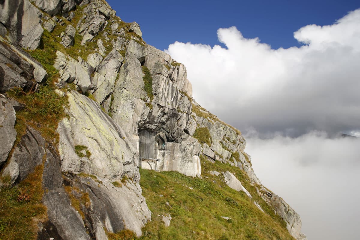 The muzzle of a 15cm gun is seen at the former Swiss artillery fortress Sasso da Pigna at the St. Gotthard mountain pass, Switzerland. Sasso da Pigna fortress, located at 6,909 ft altitude was built from 1941 to 1945 and was in military use until 1999. Si