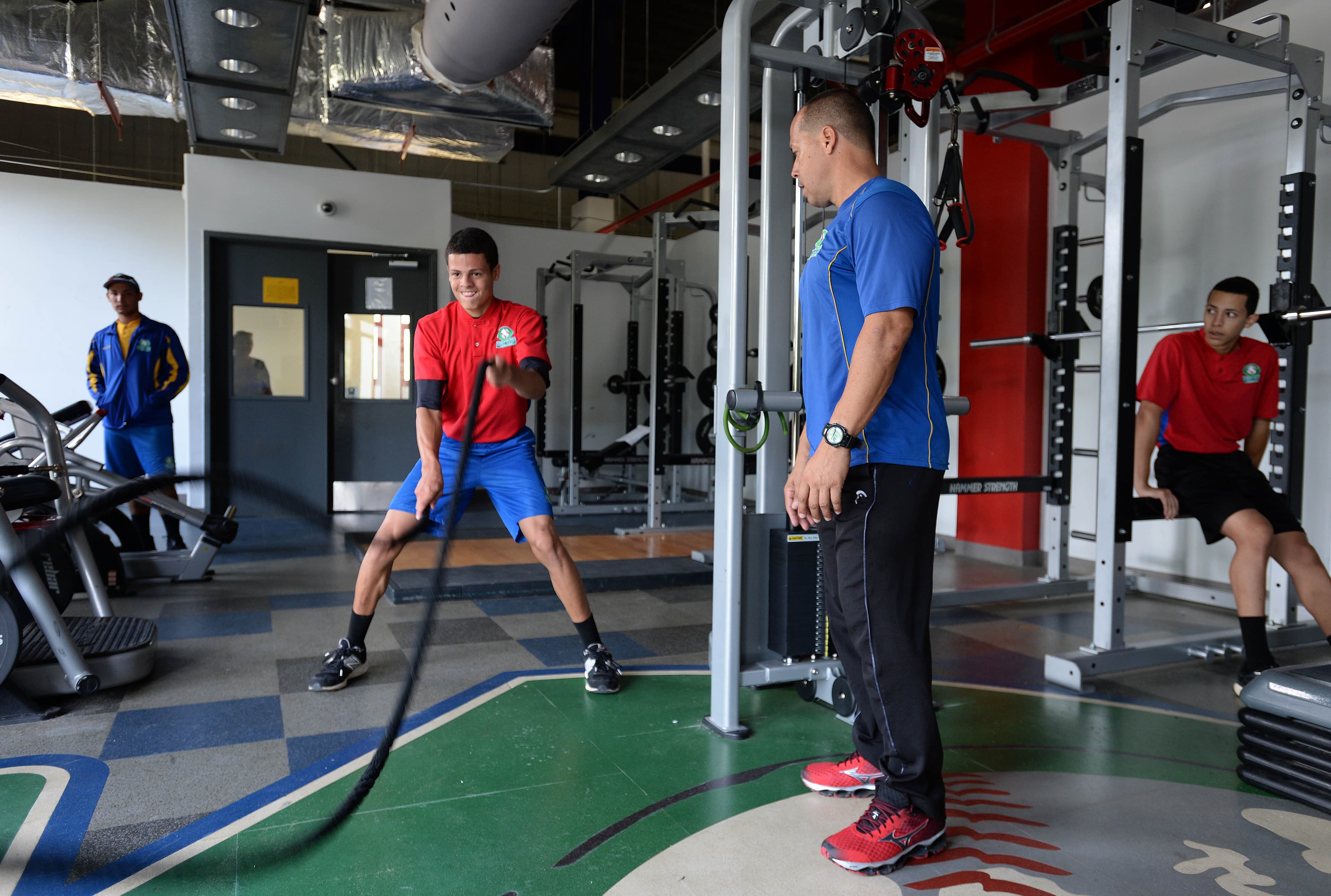 Gabriel Arroyo does a conditioning drill with ropes.