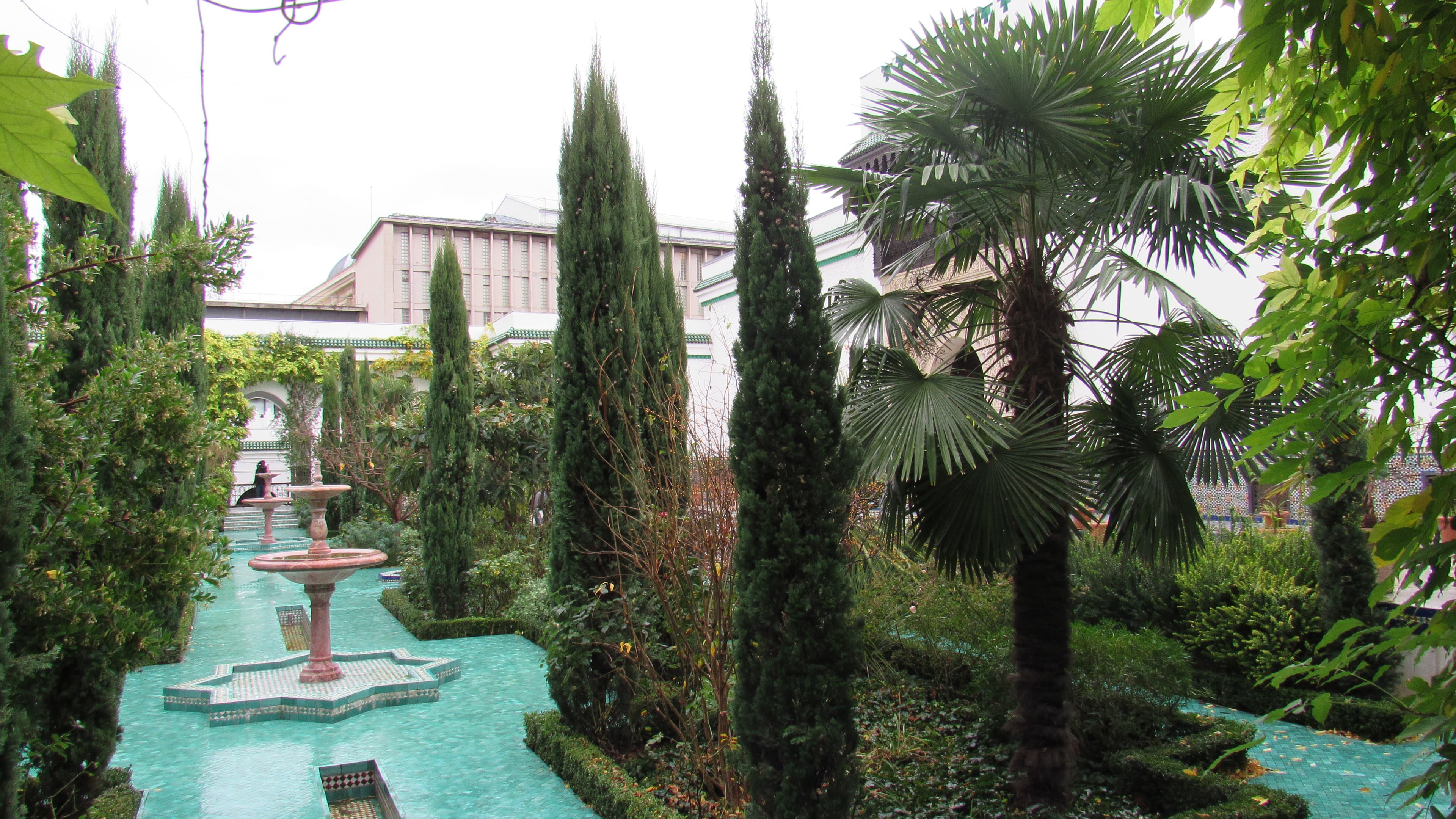 The courtyard of the Great Mosque of Paris was so calm and tranquil, you might never know that people visiting were on edge.