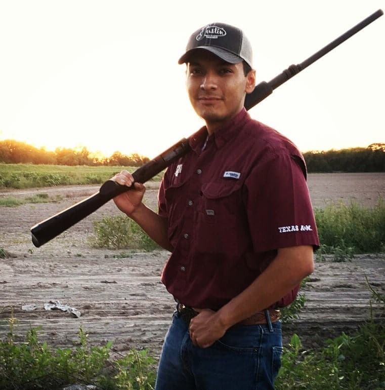 portrait of young man with a gun