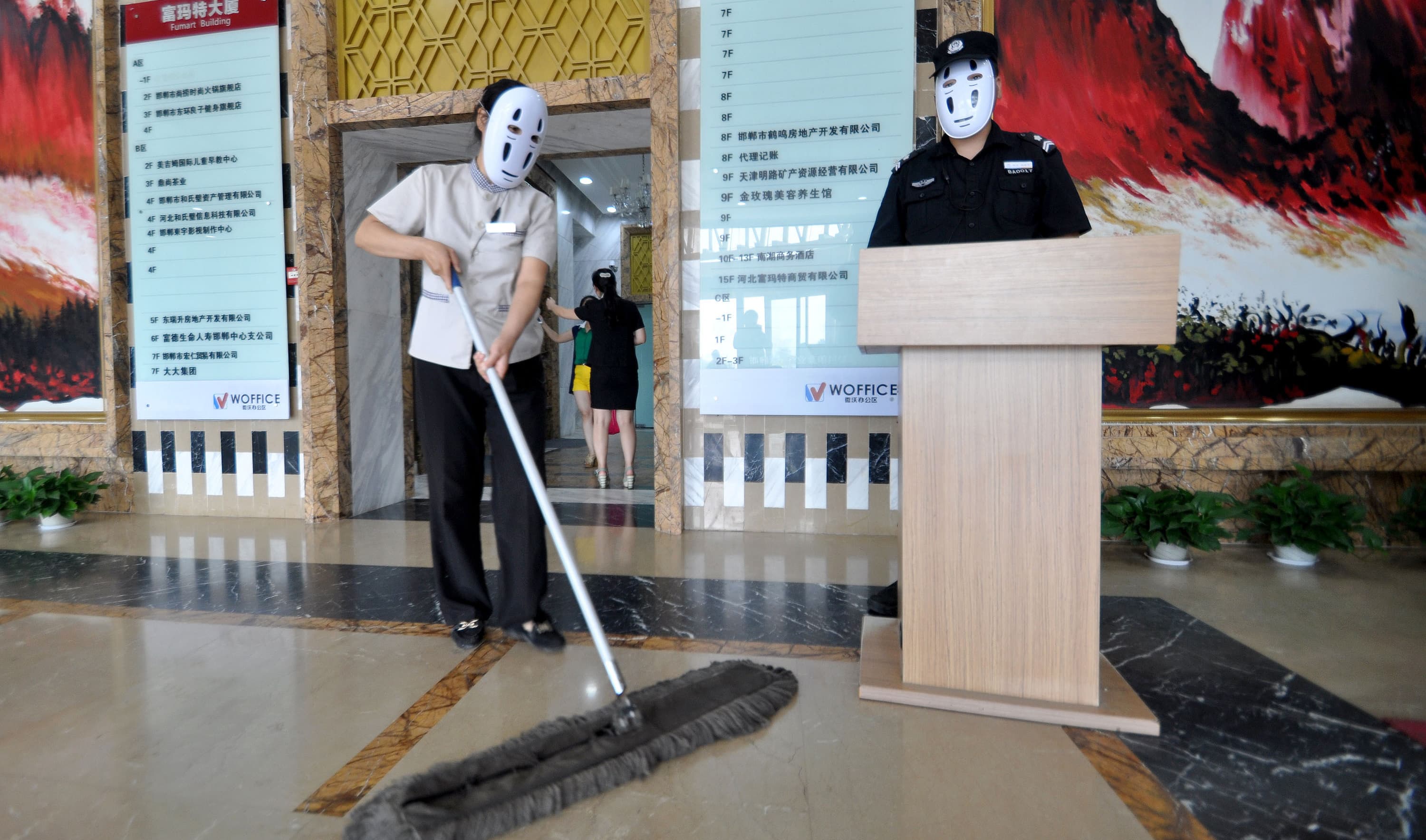 Staffs Wear No-Face Masks To Reduce Pressure During Working Time In Handan, Hebei, China
