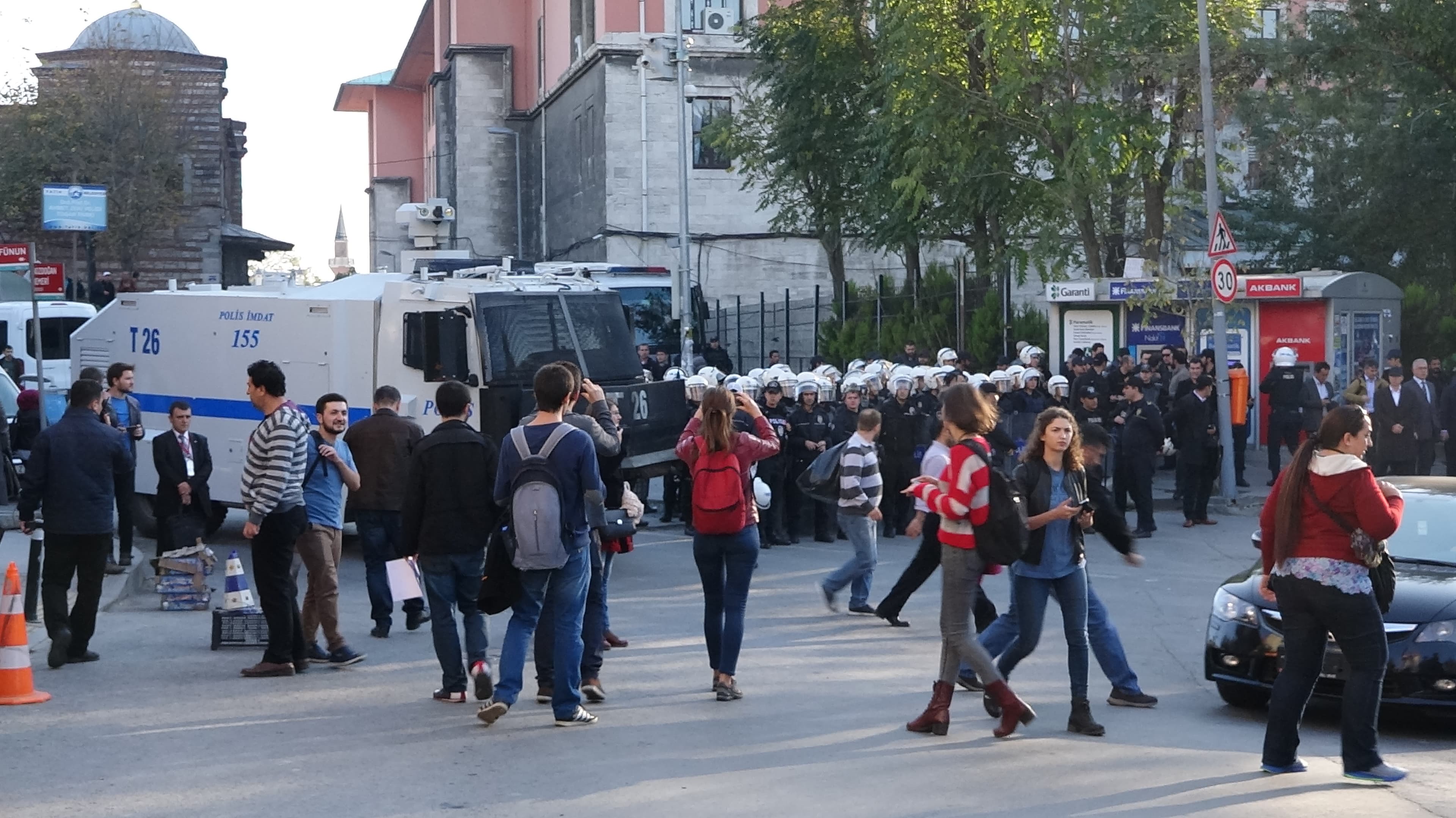 On the route of the marching protesters, Riot police took their position to intervene in case of any clashes.