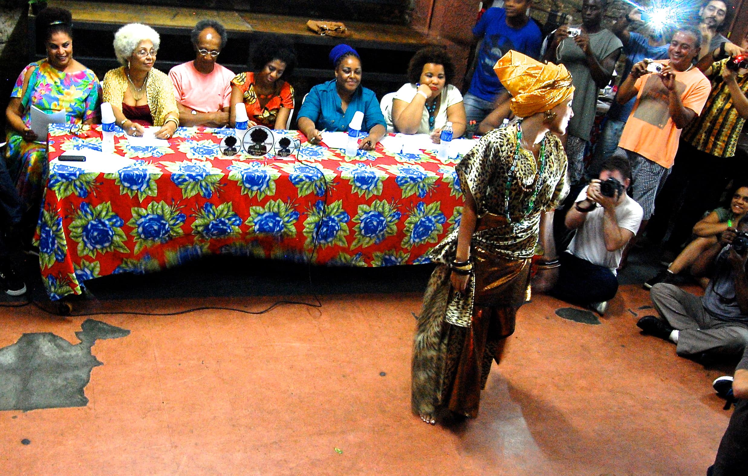 Alexia Delgado dos Santos, from São Gonçalo in the suburbs of Rio de Janeiro, smiles for photographers. “I want to reveal the beauty dictatorship that says only straight hair is beautiful,” she said in her candidacy statement.