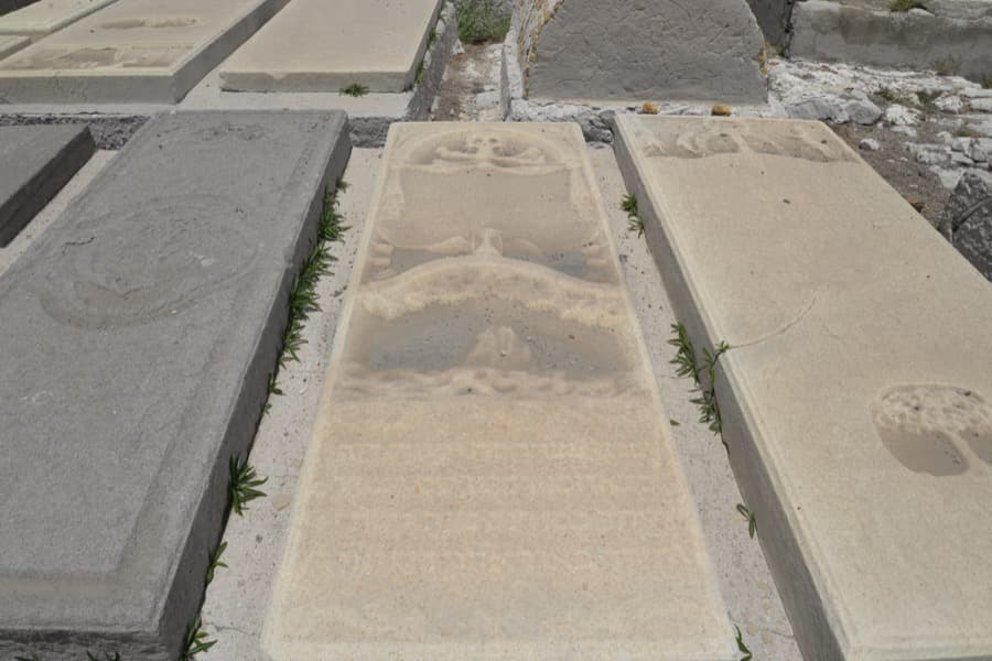 Most of the tombstones have been eroded beyond recognition.