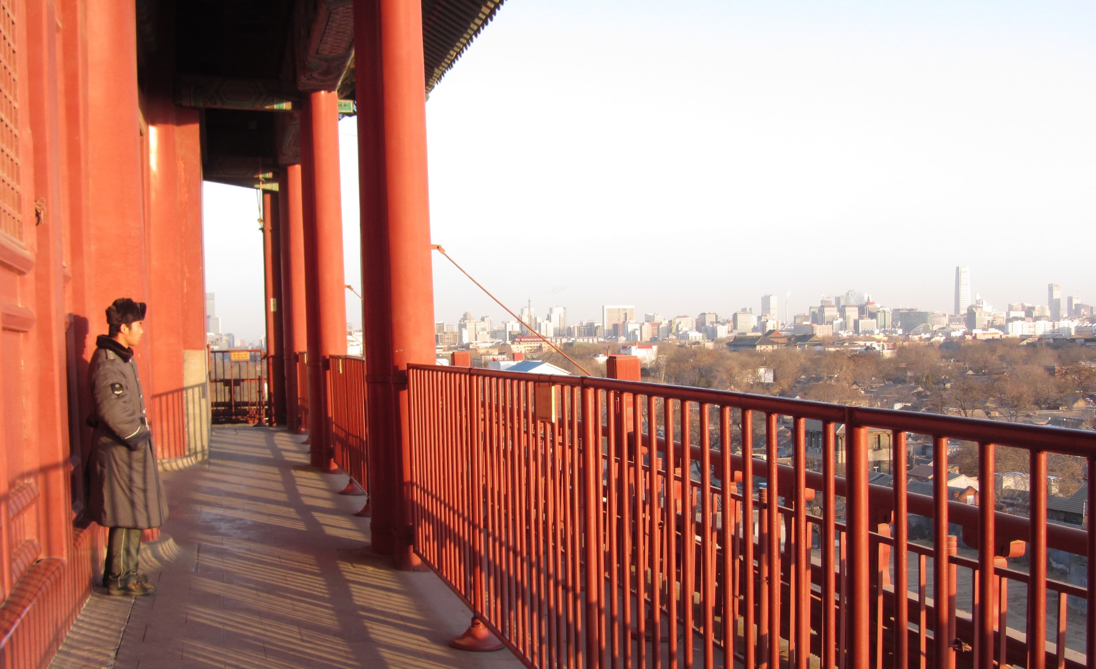 A modern skyline of a city of ambition, seen from Beijing's ancient drum tower