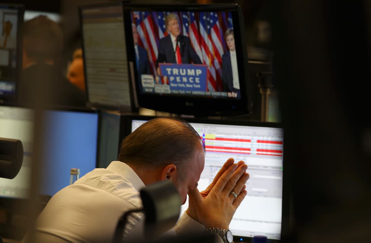 A trader at the stock exchange reacts to the US election in Frankfurt.