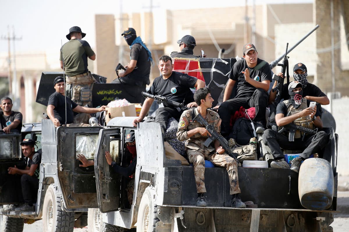 Iraqi counterterrorism forces gather in Fallujah.