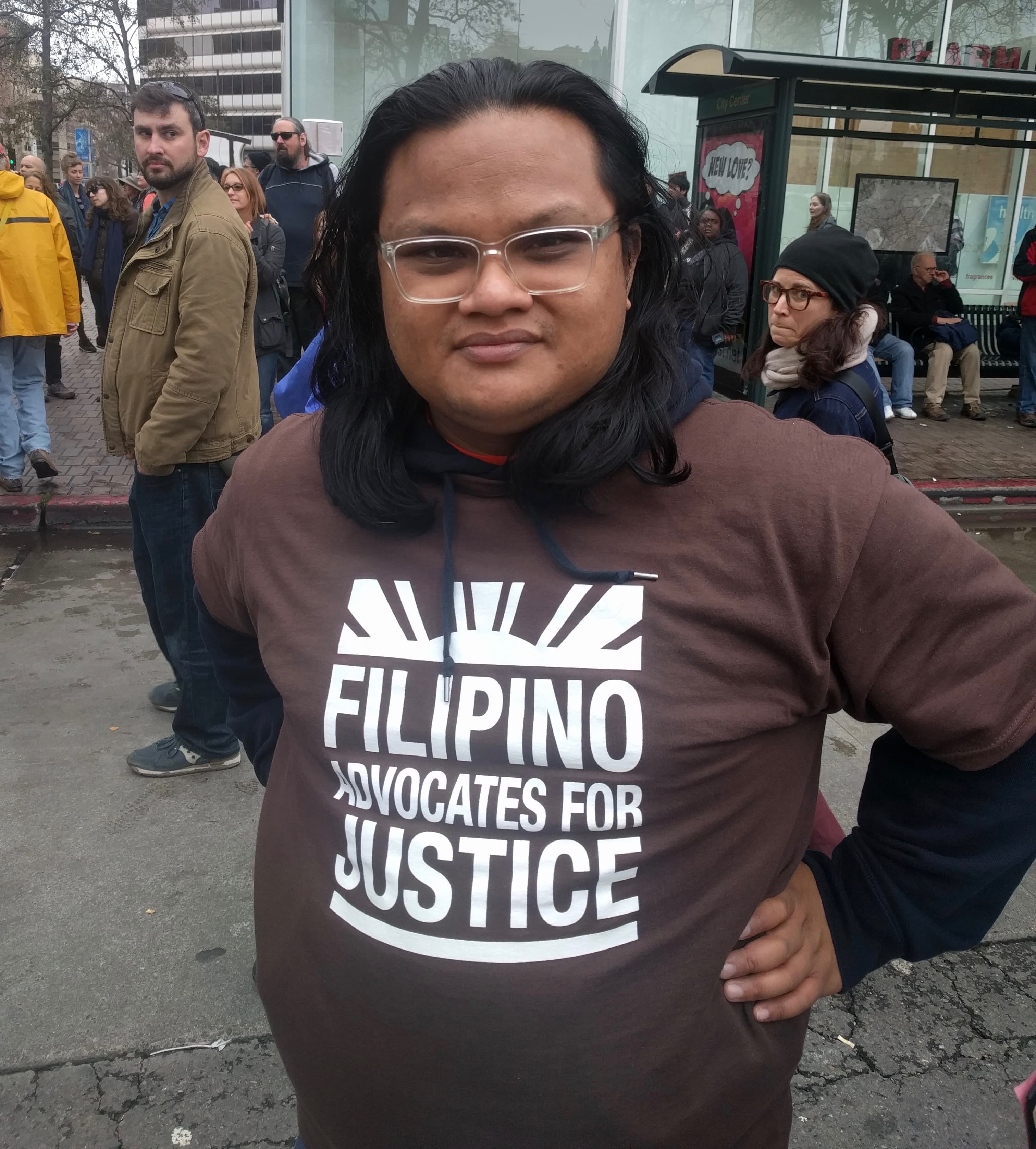 Fred Pinguel, with Filipino Advocates for Justice in Oakland, marching in the Oakland Women's March on 1-21-17