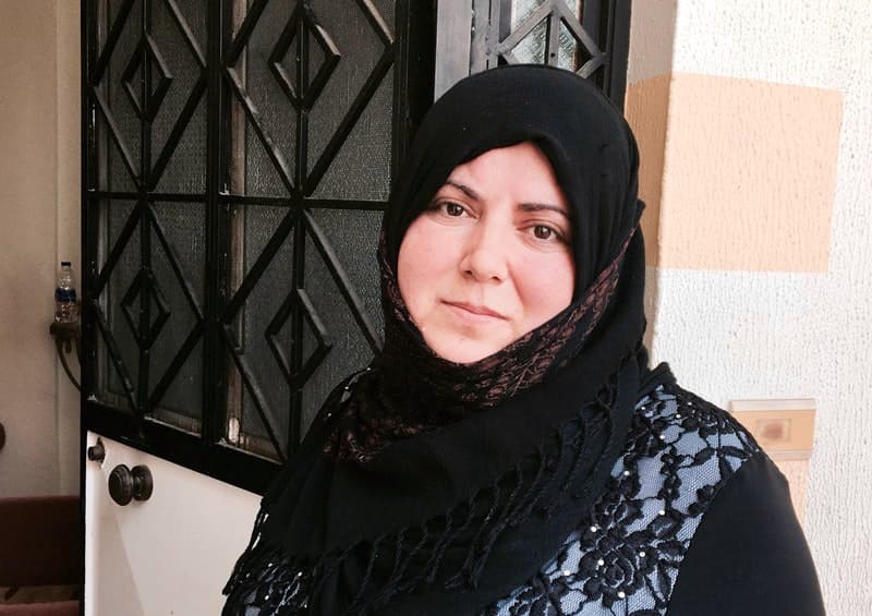 A 37-year-old refugee from Idlib, she tried to send her brother’s body back to Damascus.