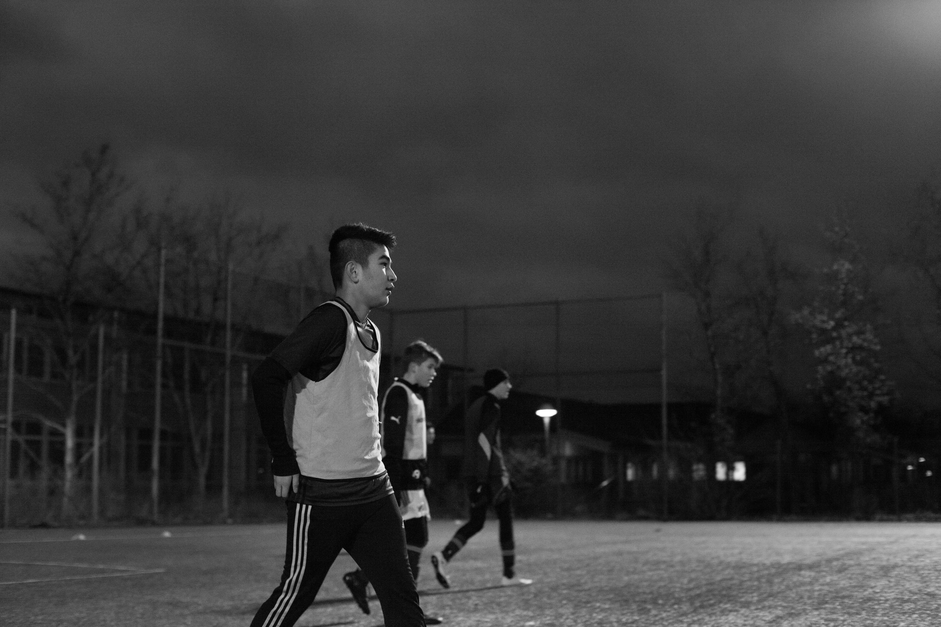 Hadi and Mahdi playing soccer.