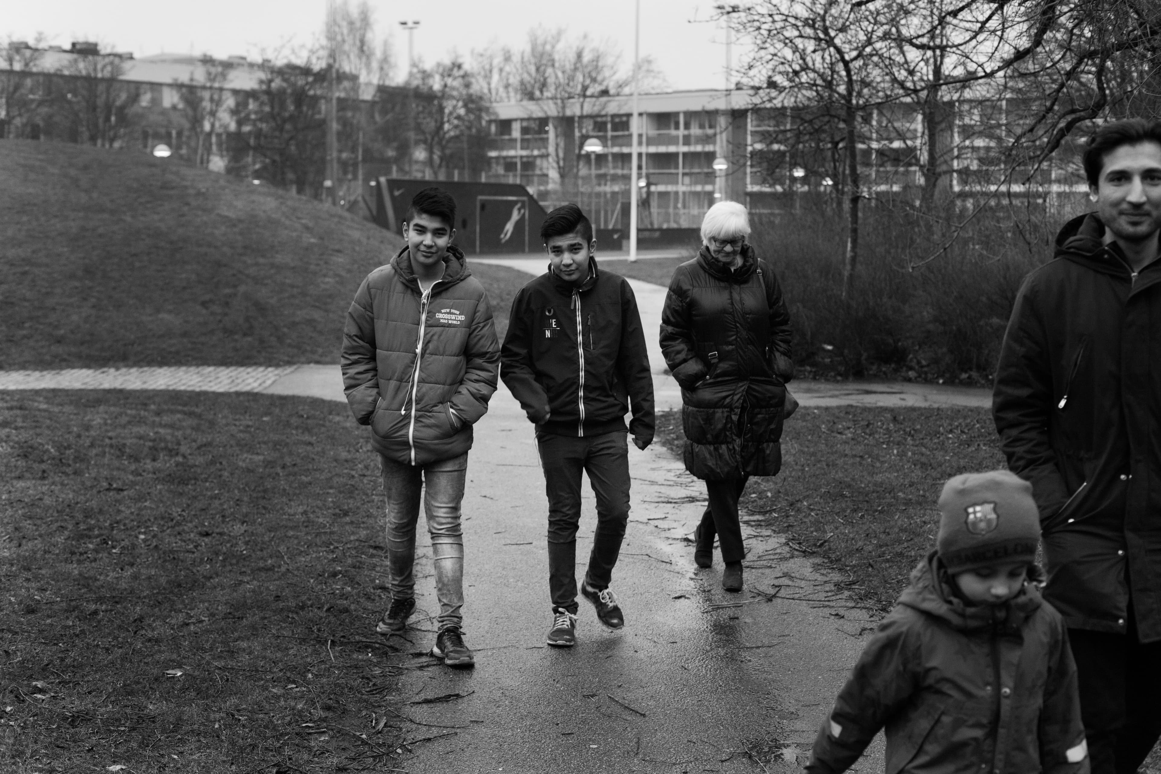 Hadi and Mahdi walk with their 