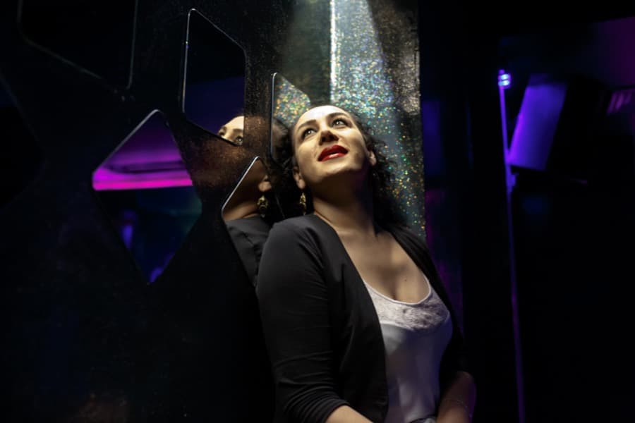 Huzun Coskun, a transgender 30-year-old, is a bar tender at a bar called No Name.