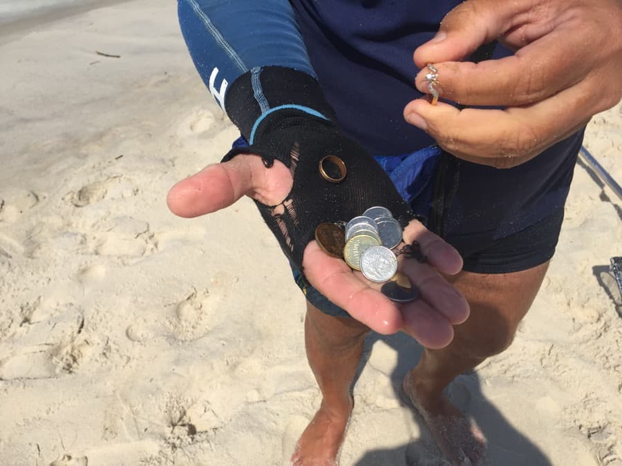 Sometimes jewelry pops up in the morning beach treasure hunts in Rio.
