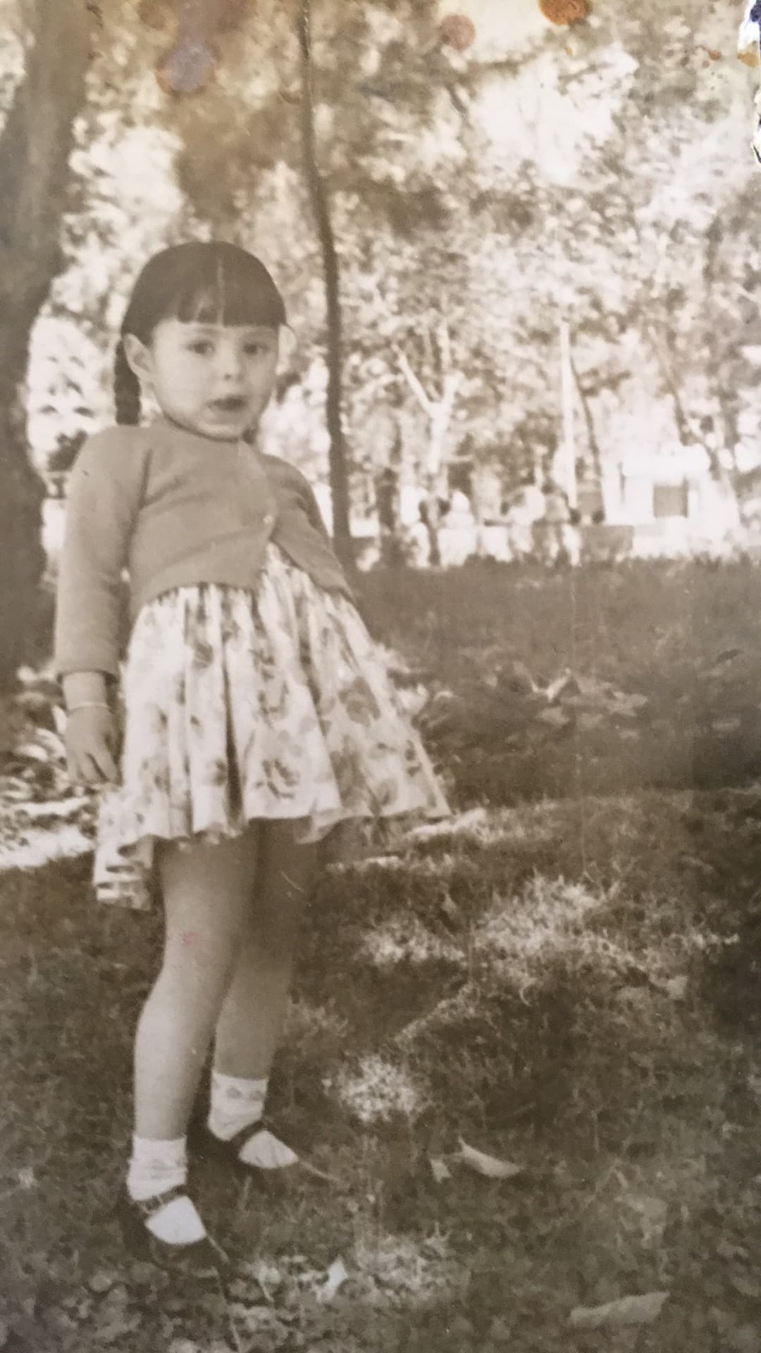 Black and white photo of a young girl
