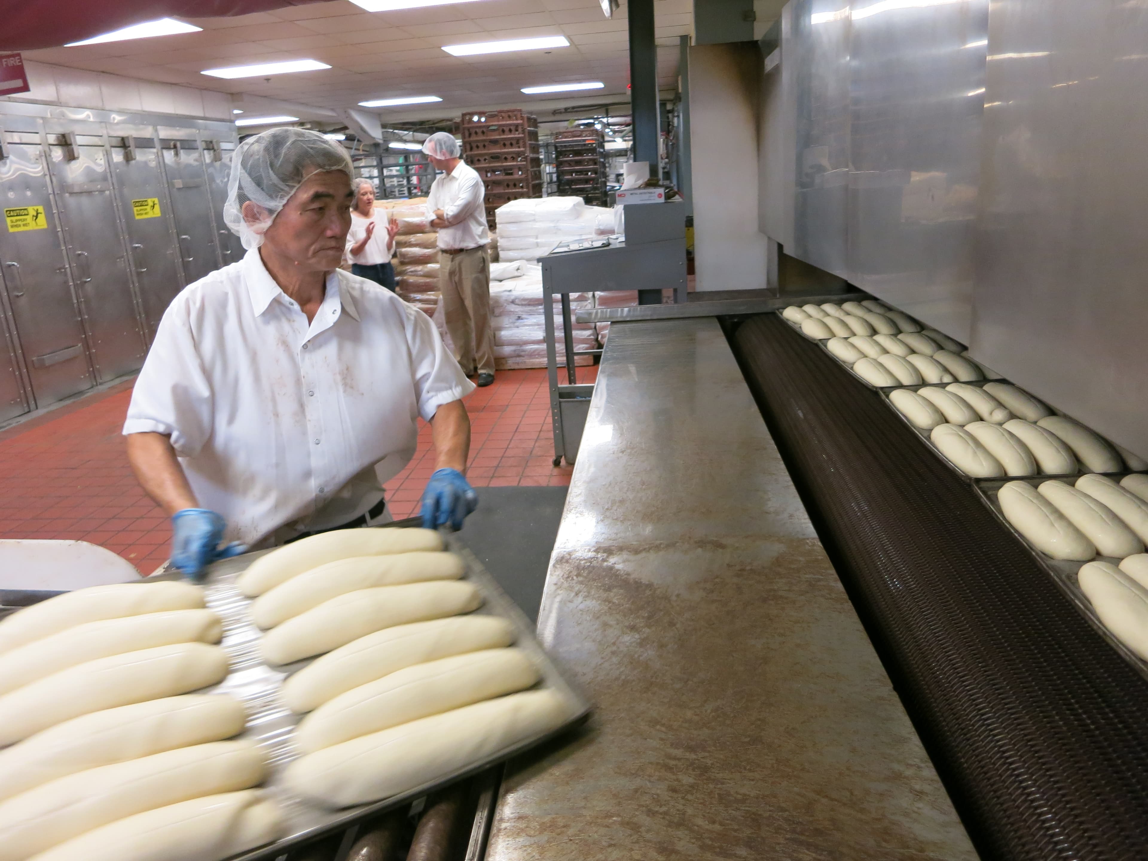 Refugee workers bake bread at the Koffee Kup Bakery in Burlington, VT.