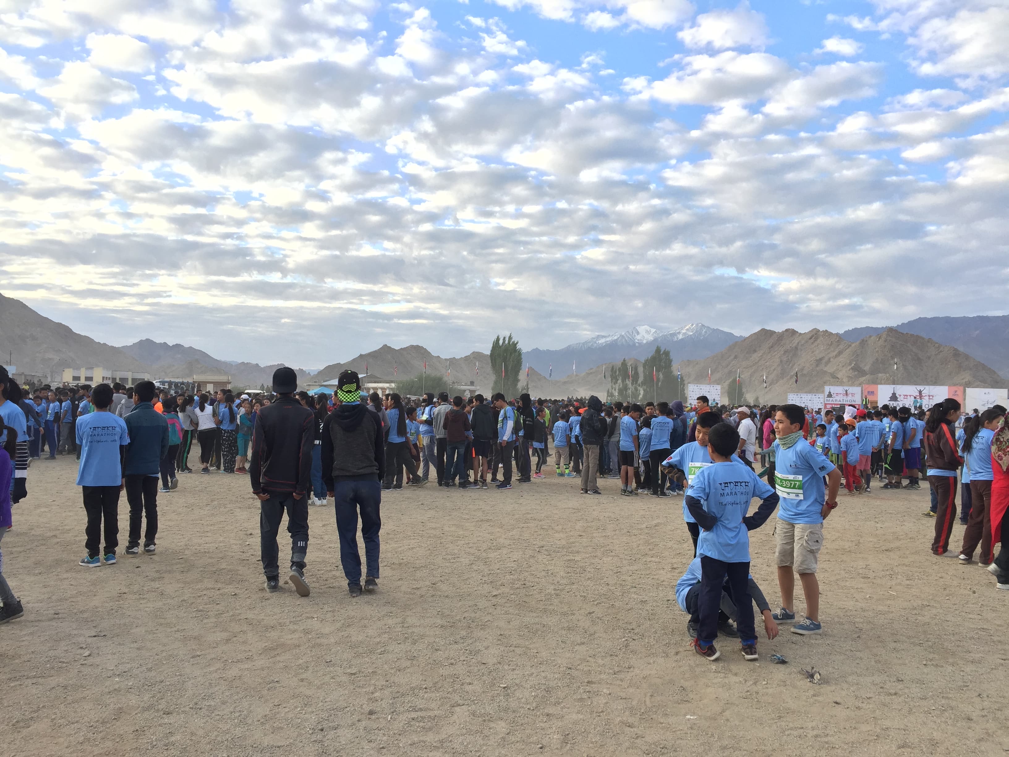 Local children collect before participating in the 7K 'Run for Fun' at the Ladakh Marathon.