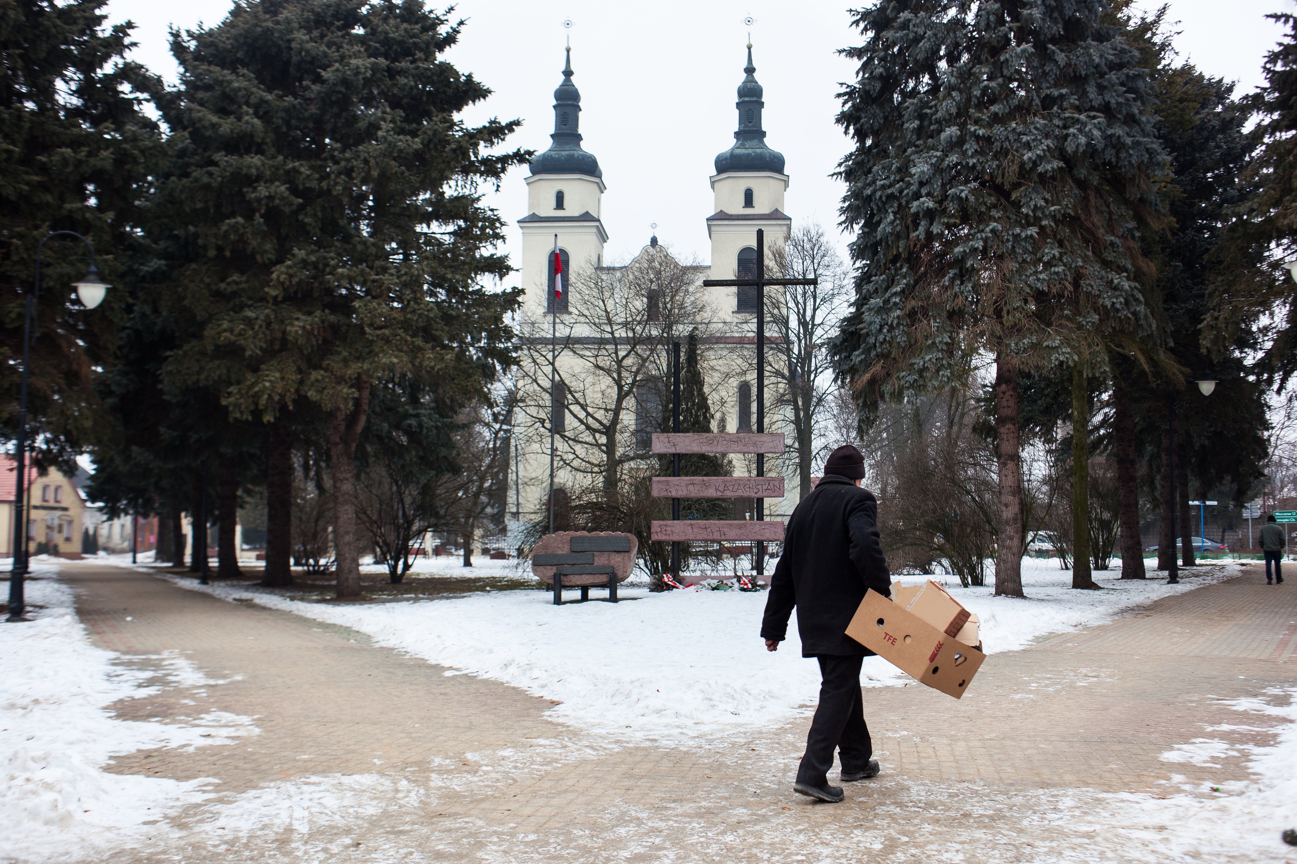 monument outside of a church in Poland