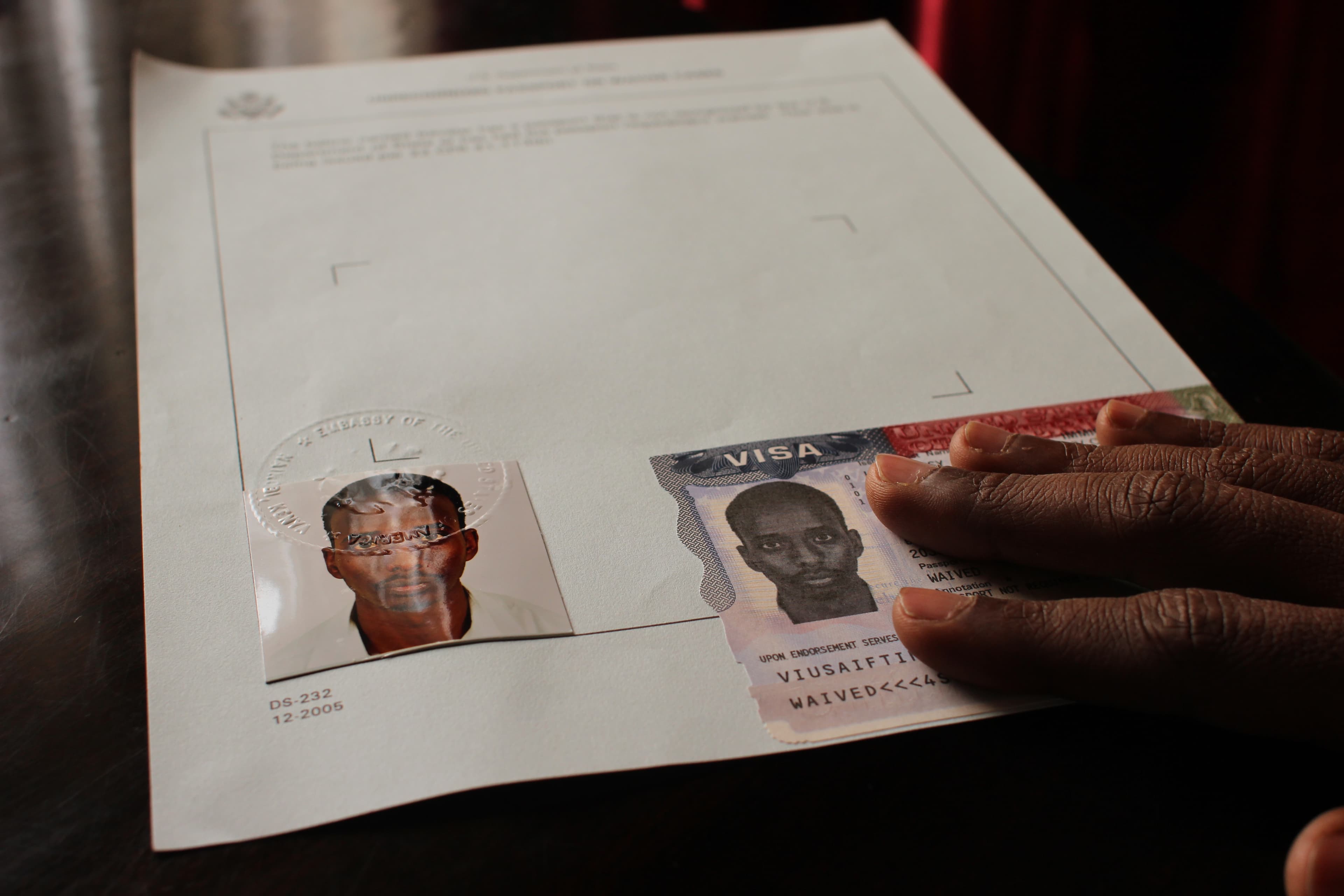 Abdi was issued a visa to enter the United States, but had no Somalian passport to put it in.