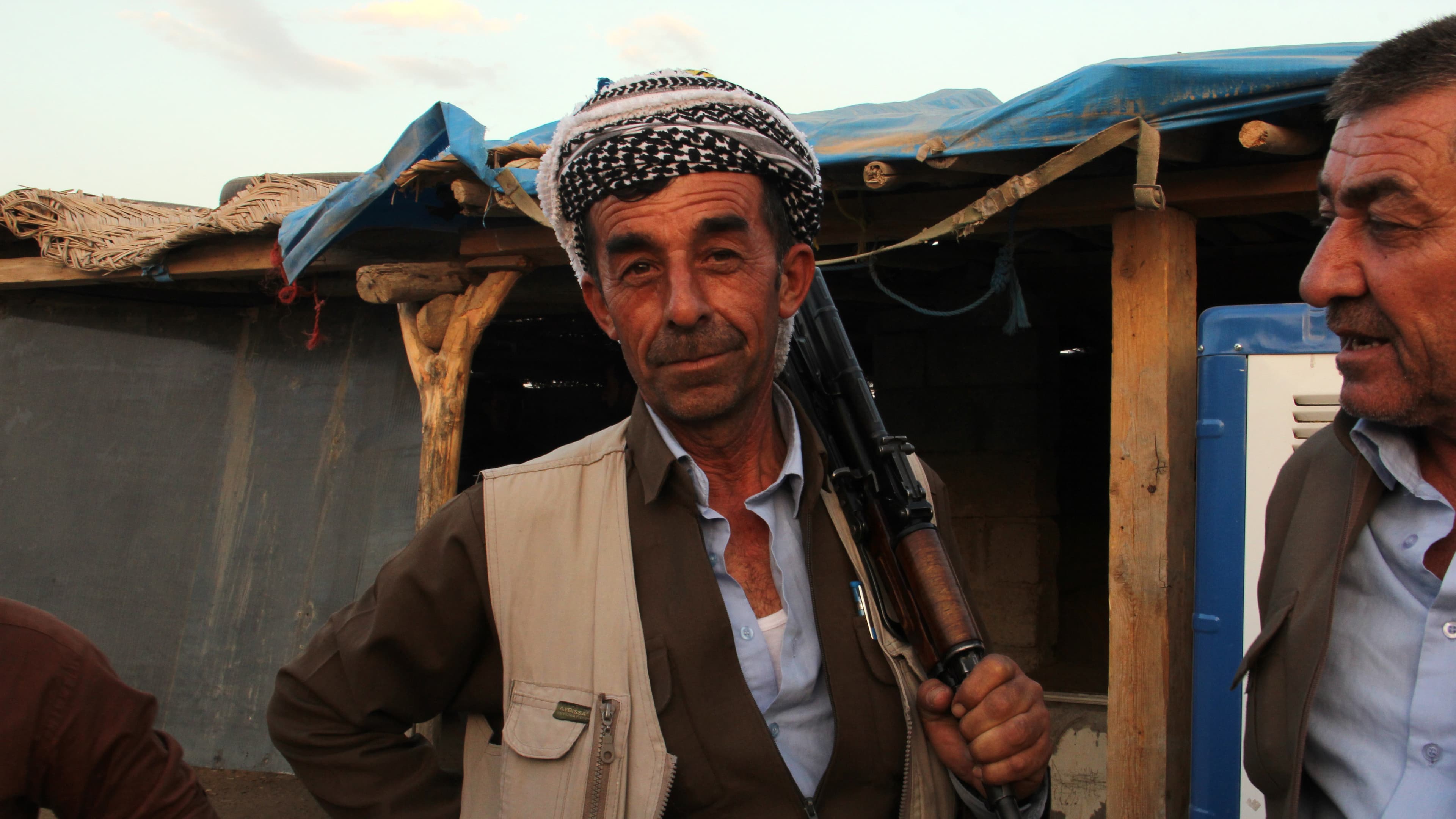 A Kurdish weapons dealer in the Erbil gun bazaar. He’s being hawking arms for more than 20 years.