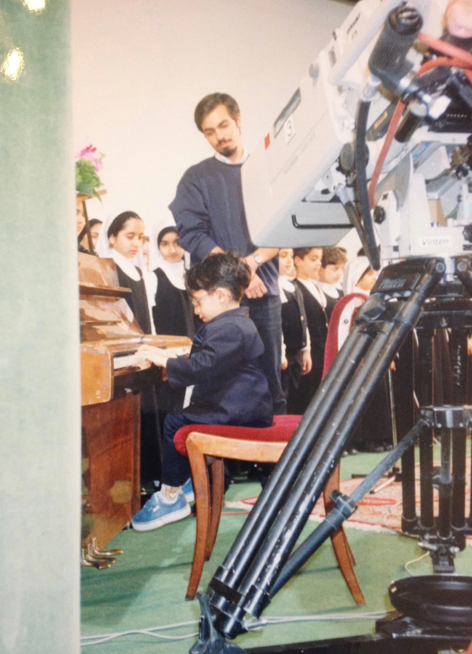 Four-year-old Amir Darabi on stage in Tehran.