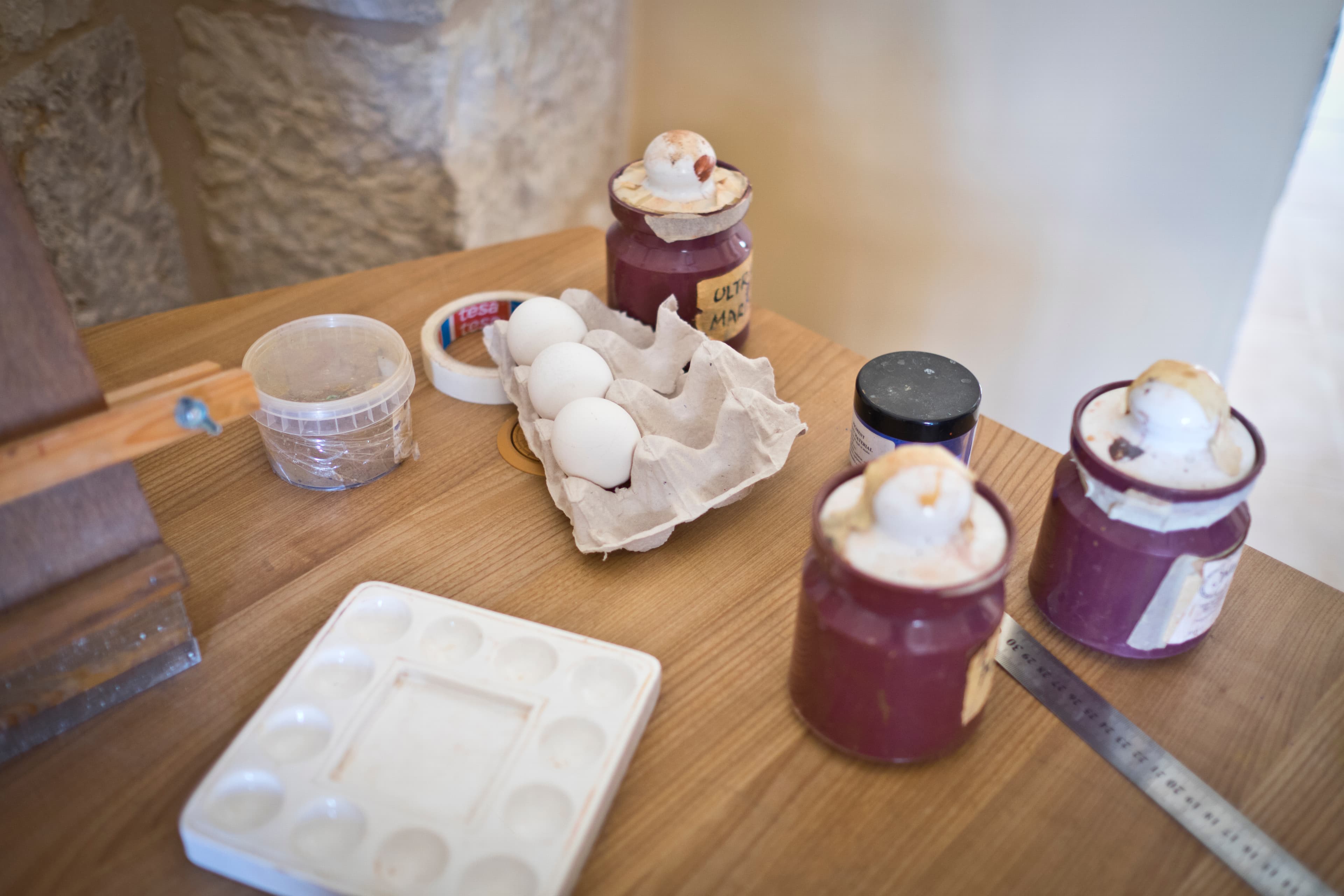 Students learn how to make egg tempera, a kind of paint, using egg yolk, vodka, water and some natural pigments.