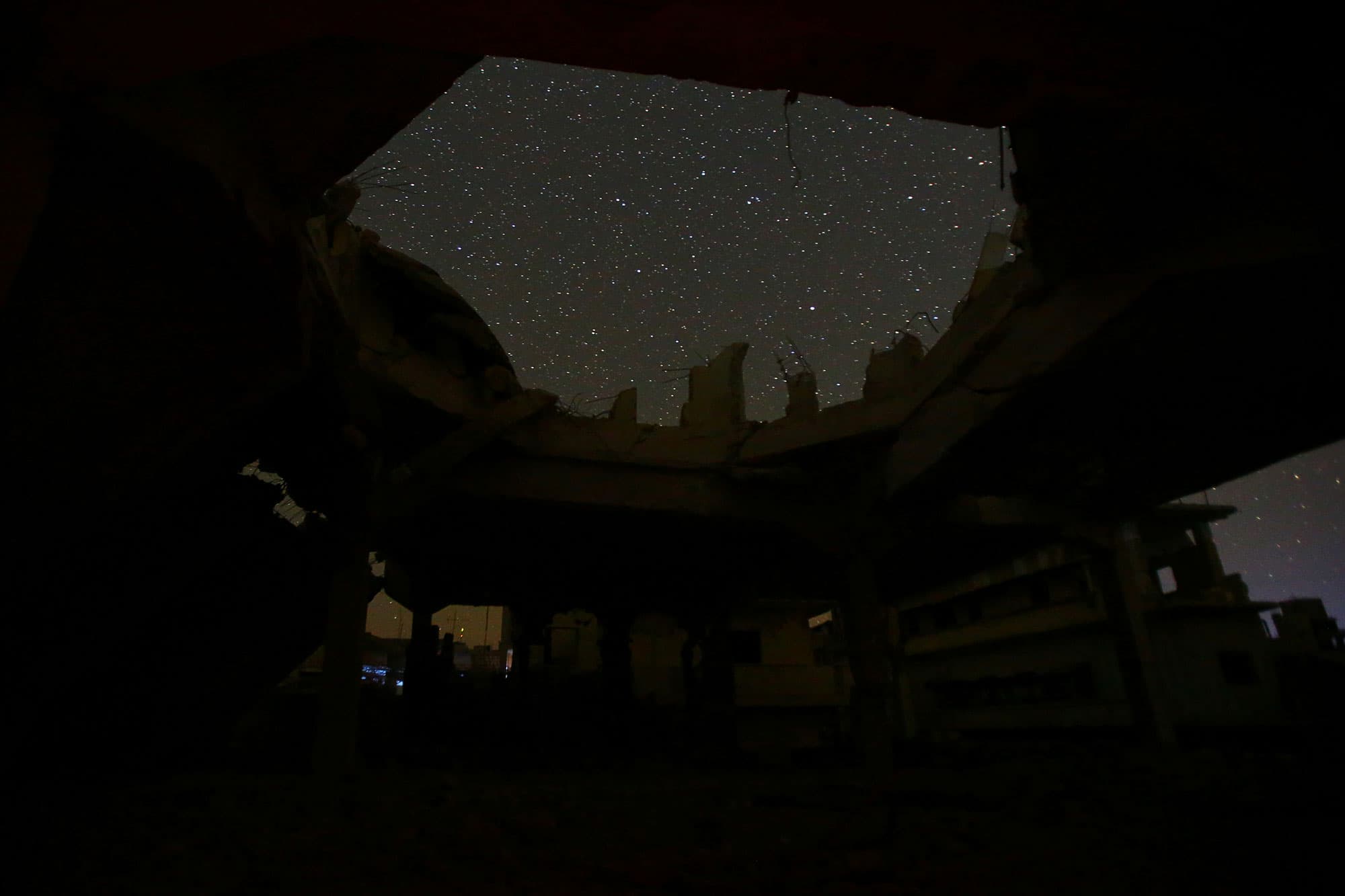 A damaged building stands in the rebel-controlled town of Binnish in Idlib province.
