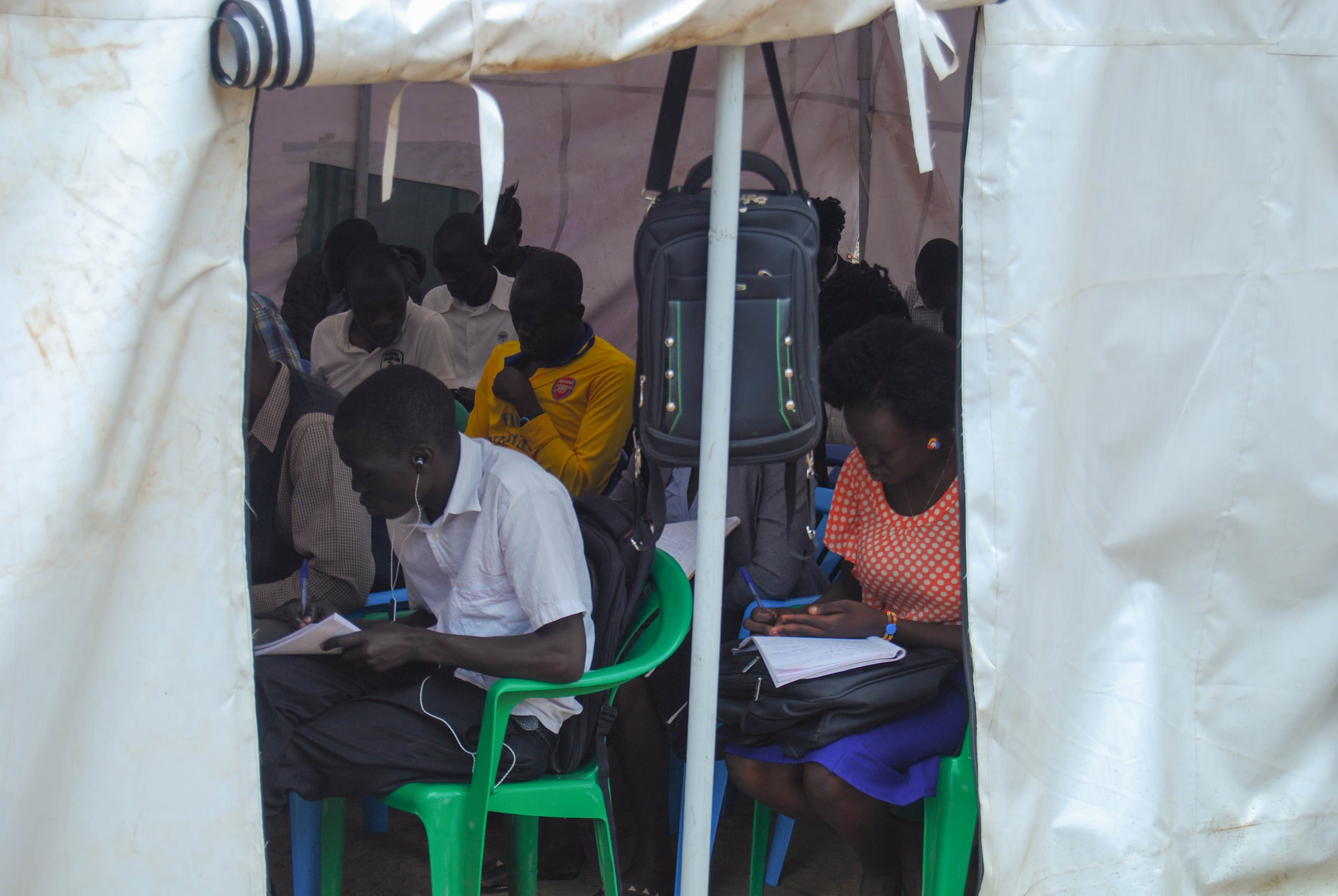 Classes at the Kajo Keji Health Training Institute are taught in white tents that can become stifling in the afternoon sun.