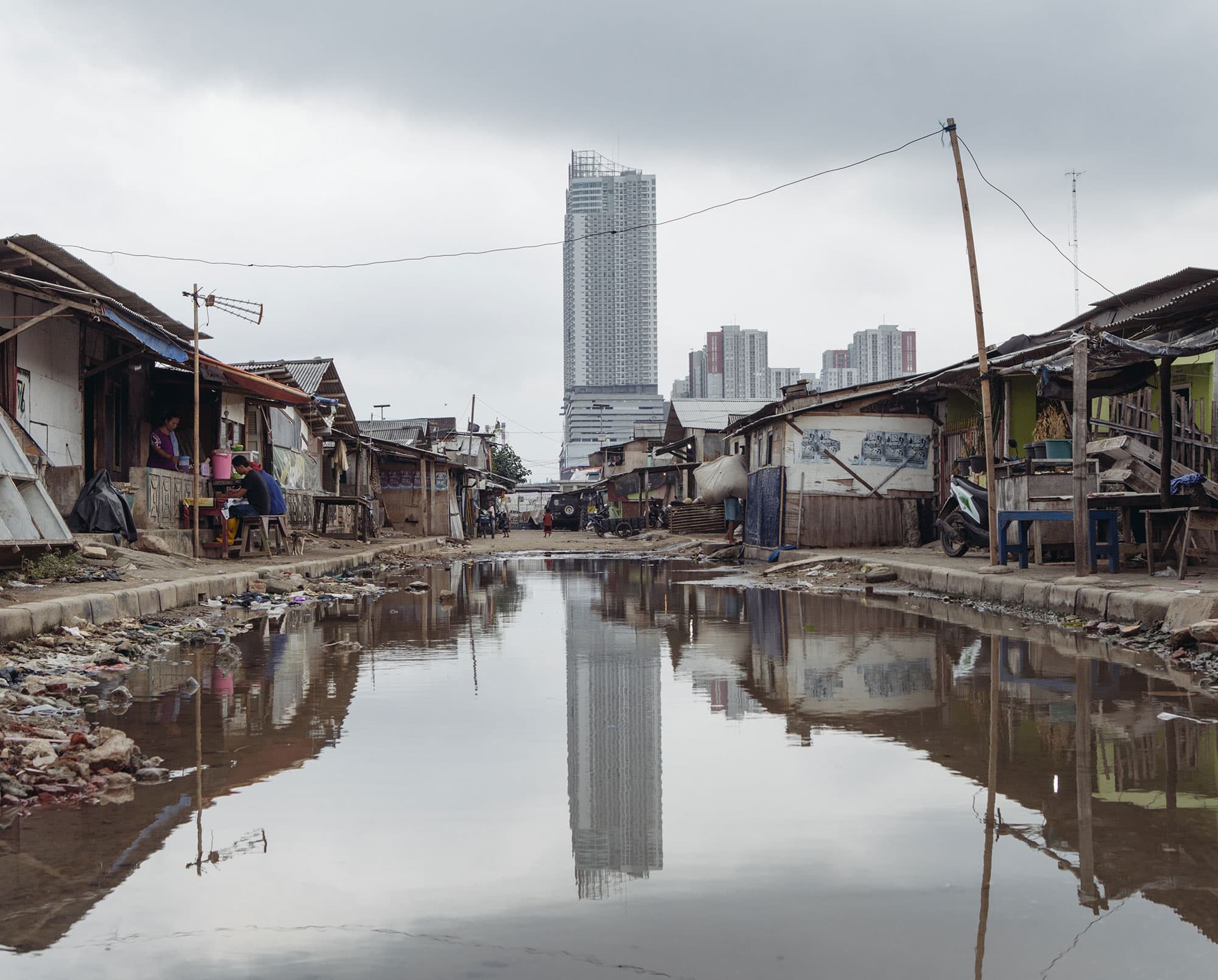 Seawater floods some streets in Jakarta's Muara Angke neighborhood even during low tides and the dry season. Most of the district's residents are fishermen who work in nearby Jakarta Bay.