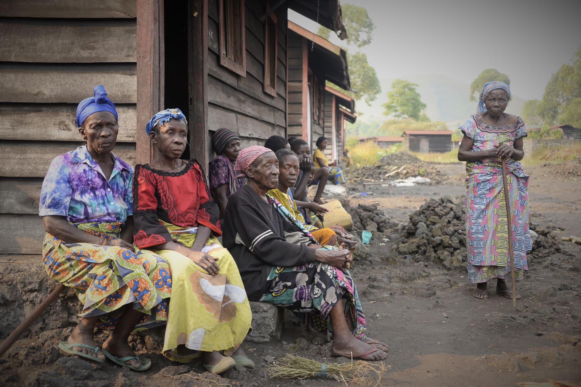 Older women pictured here who have been in the Mugenga camp 15 to 20 years. They’re all widowed.