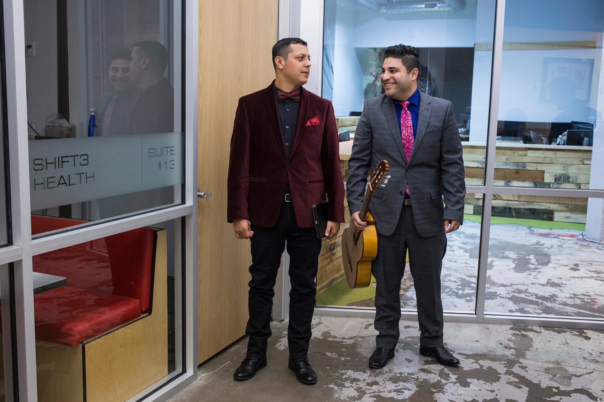 Omar and his collaborator, violinist Patrick Contreras, wait outside the theater before going on stage for their show, VIVO.