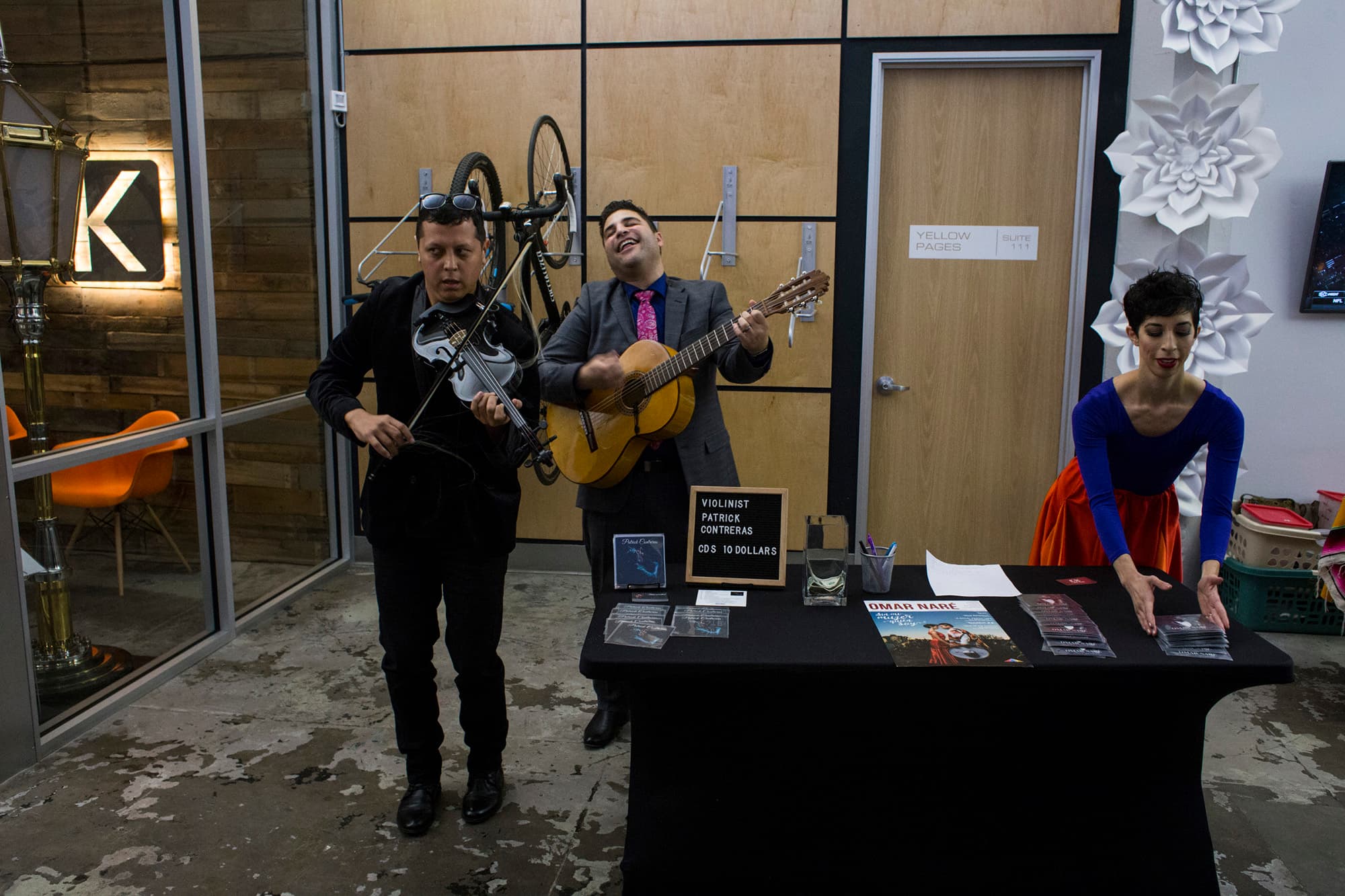 Omar, Jasmín and Patrick reunite outside the theater to finish off the finale of their show, as the audience comes out to greet them.