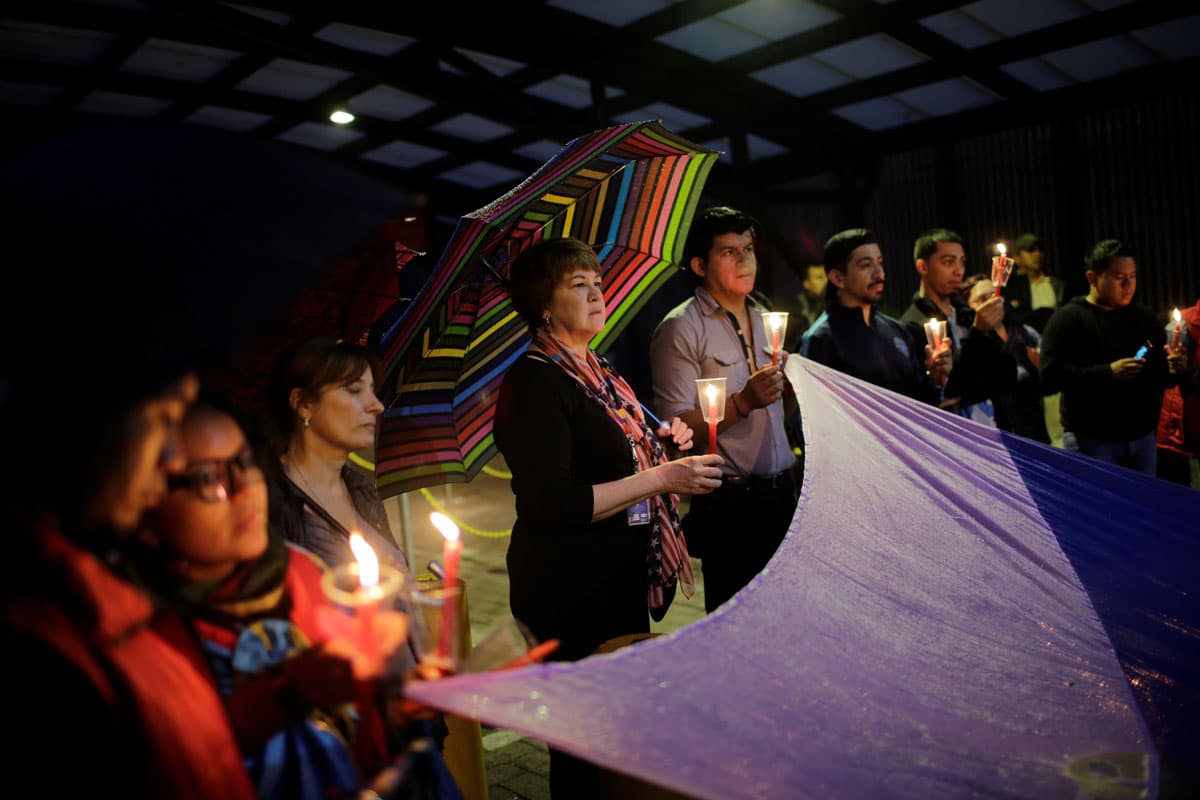 People take part in a vigil for the victims of a mass shooting at a gay nightclub in Orlando, outside the US embassy in Guatemala City, Guatemala.