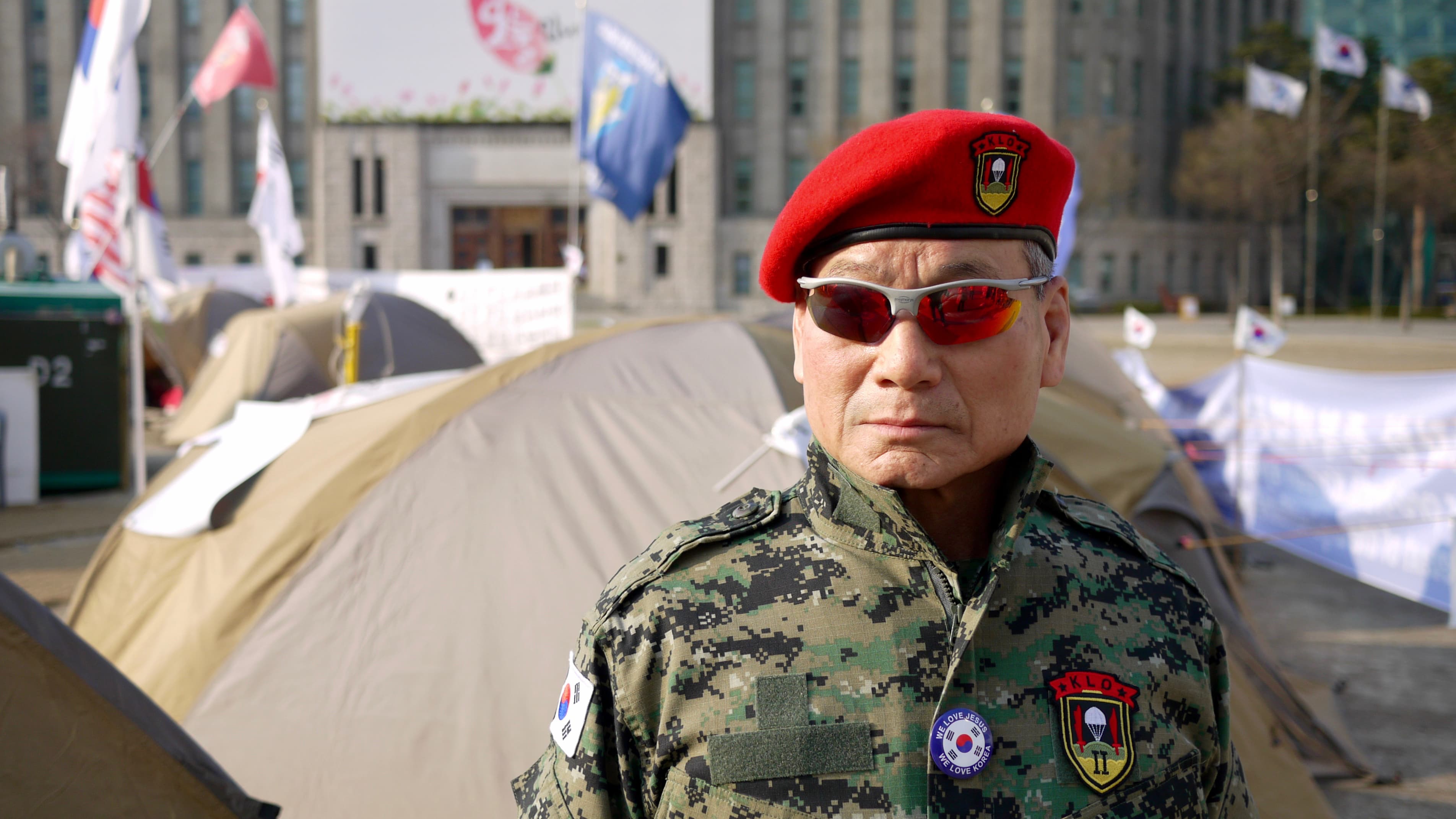 Lim San-mook has been spending time at a protest camp at Seoul’s City Hall. The South Korean army veteran says the North Korean communists are a real threat to the South, and the younger generation just doesn’t understand.
