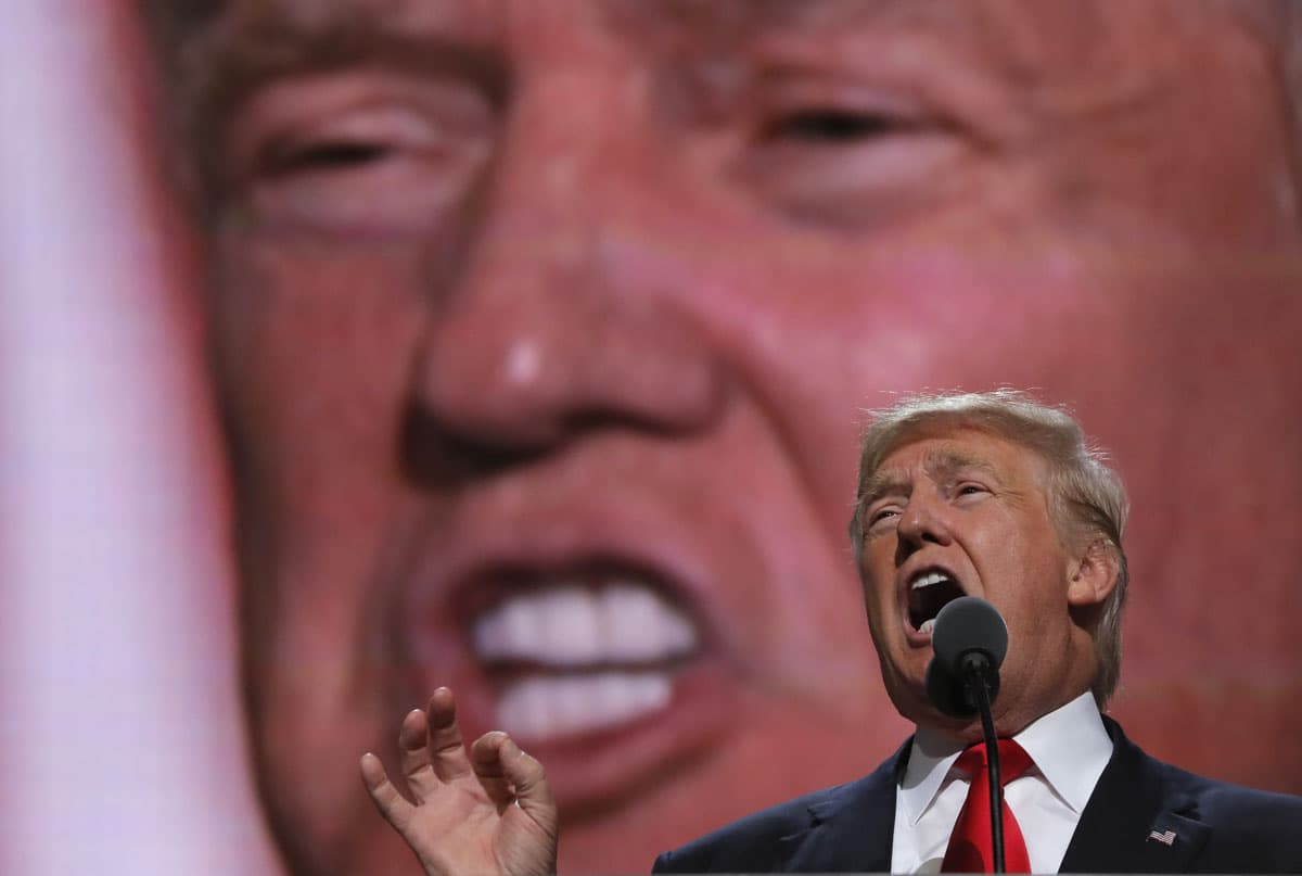 Donald Trump speaks as he accepts the nomination during the final session of the RNC.