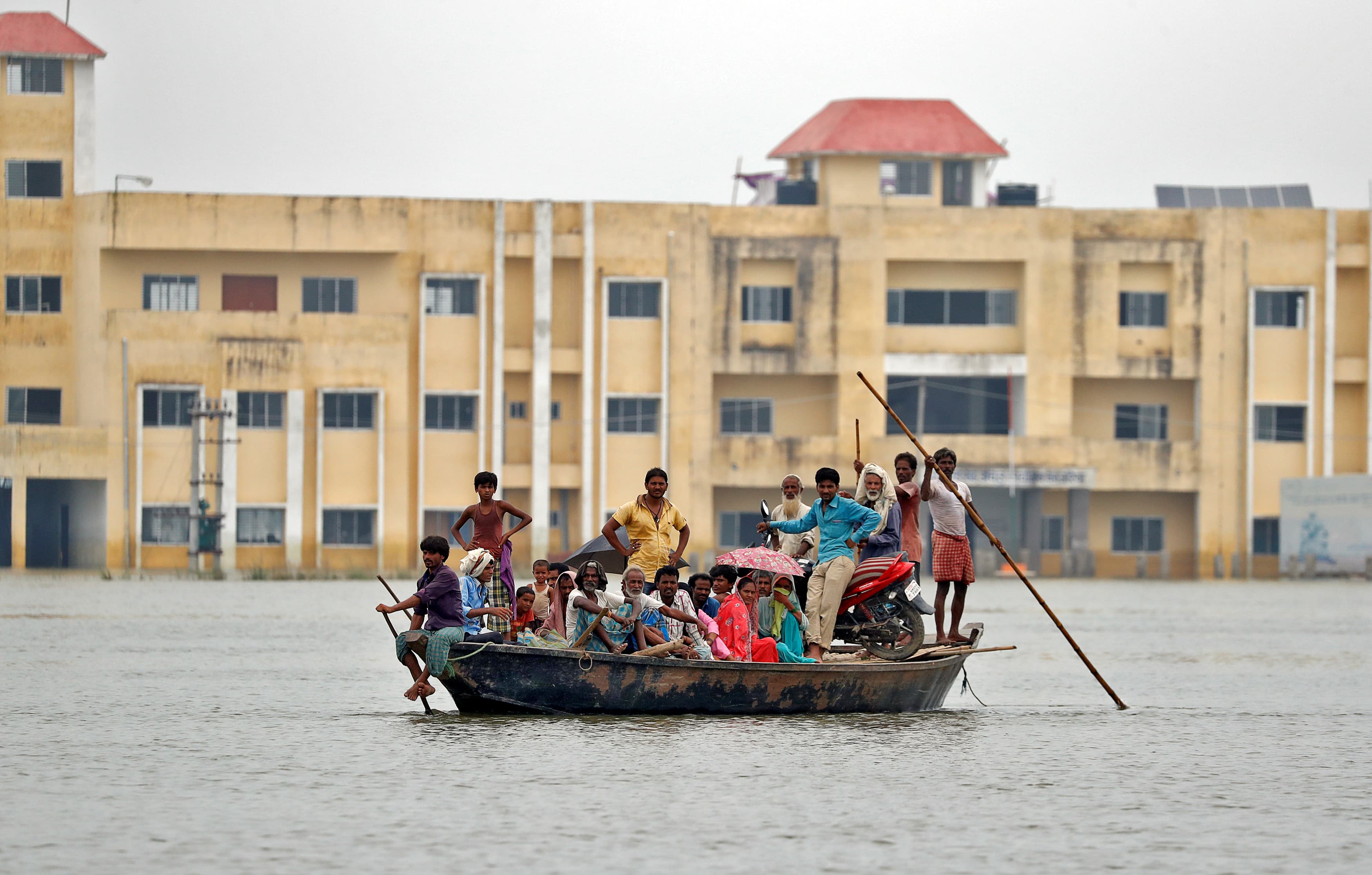 People are rescued from a flooded village in Motihari, Bihar state.