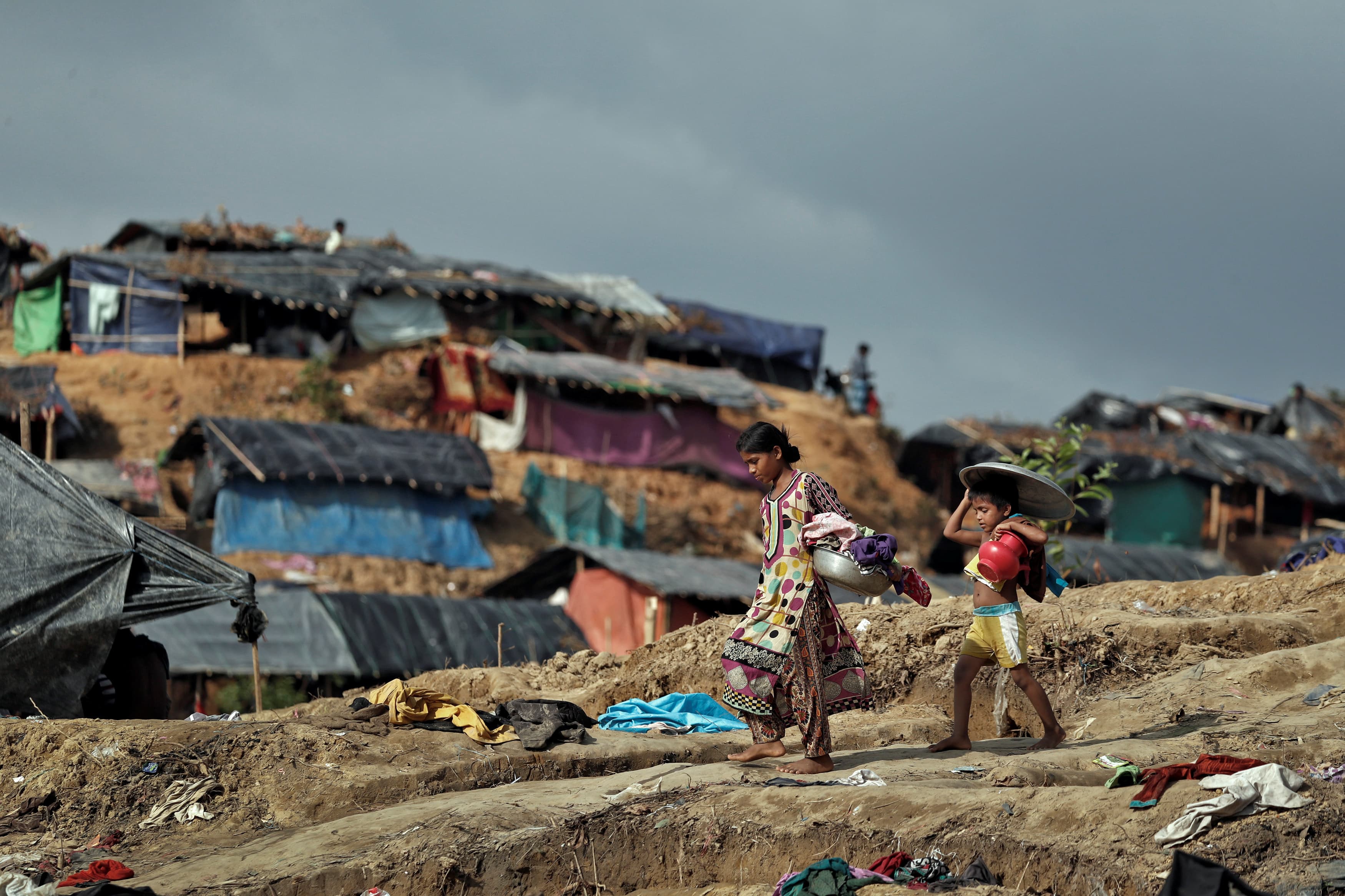 Rohingya children walk through a refugee camp in Cox's Bazar, Bangladesh, Sept. 26, 2017.
