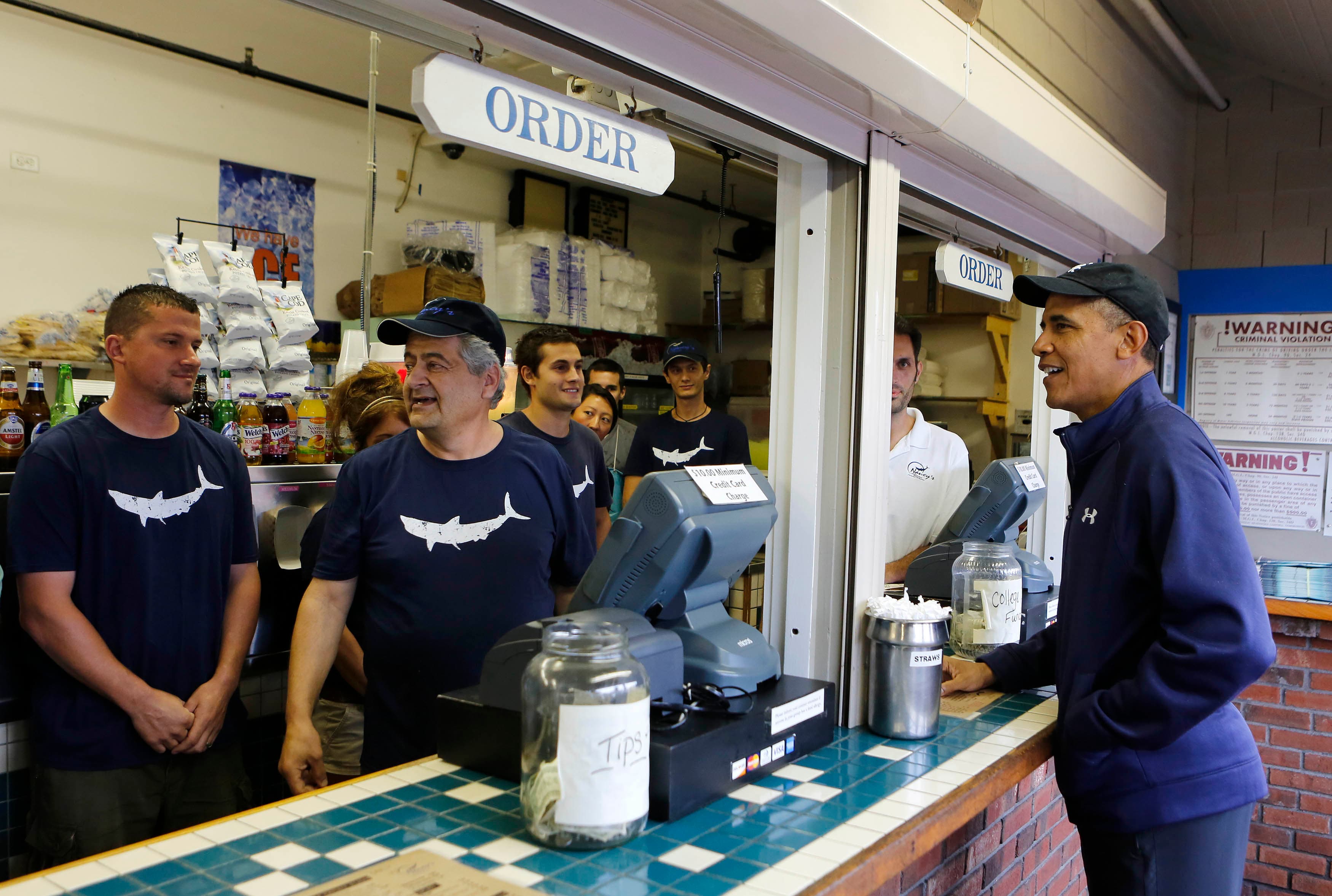 US President Barack Obama orders lunch at Nancy's restaurant